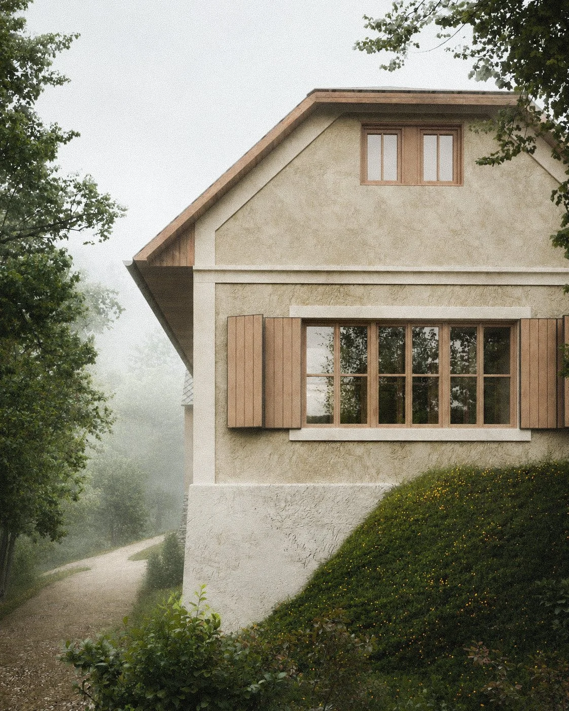 A house with beige textured walls, wooden shutters, and large windows, surrounded by greenery and misty trees.