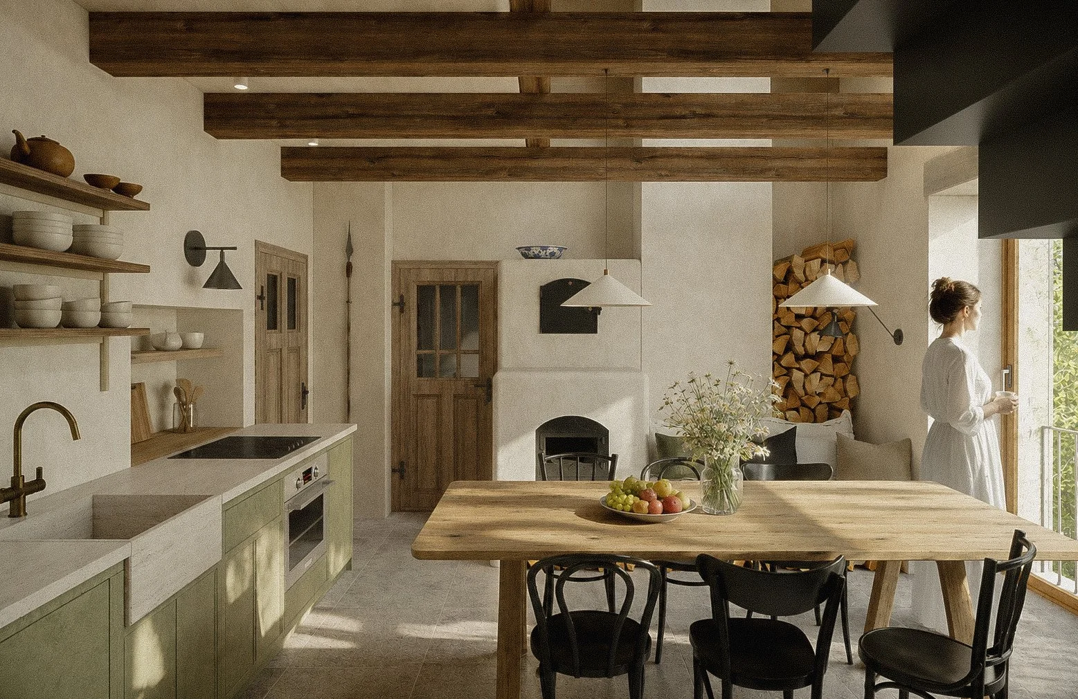 A cozy kitchen with a wooden dining table, black chairs, open shelves with white dishes, a stove and sink, a wood fireplace with wood stacked beside it, a woman in a white dress standing near a window with sunlight, and green trees visible outdoors.