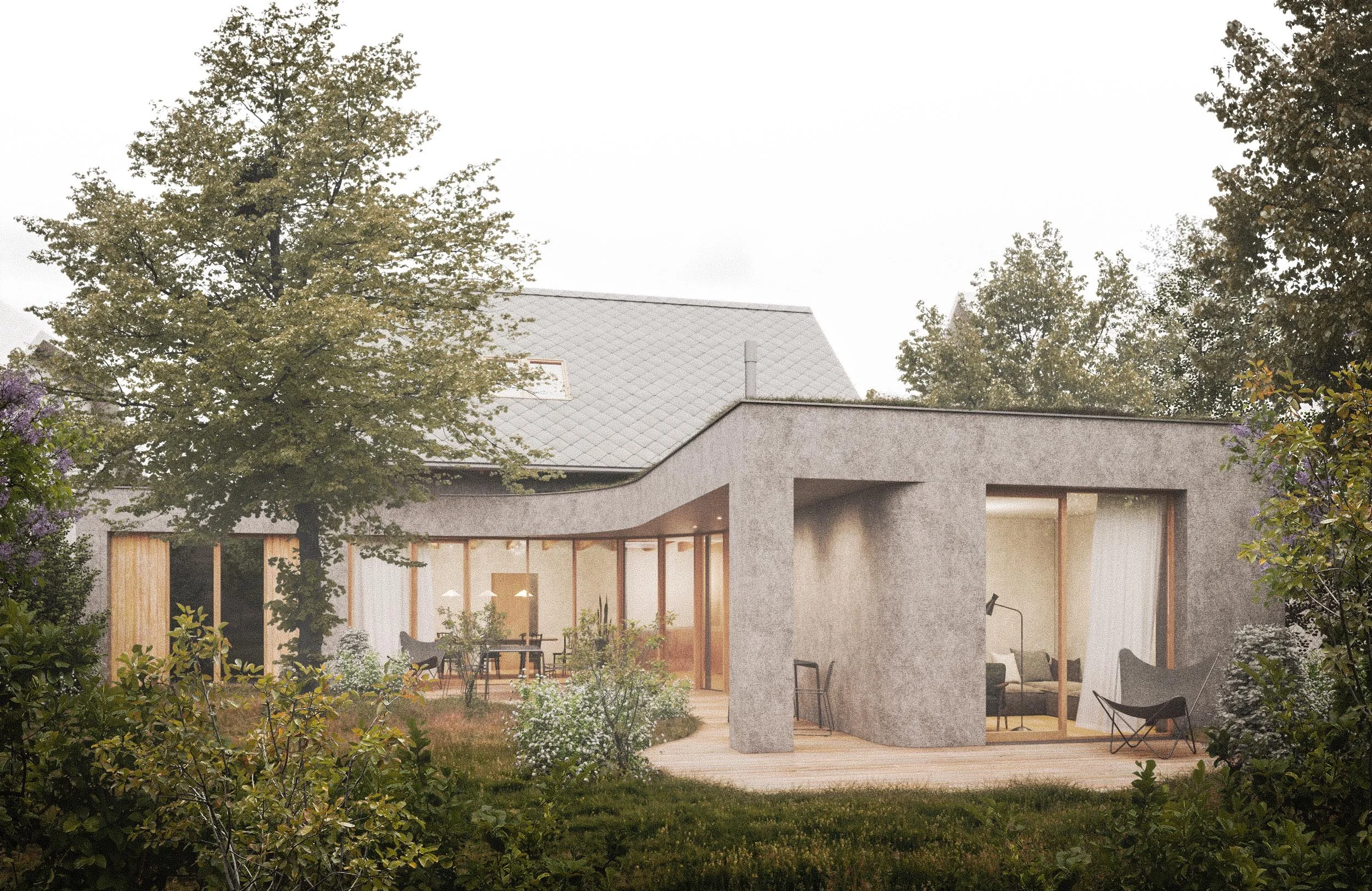 Modern house with large windows and gray exterior, surrounded by lush trees and garden with outdoor furniture.