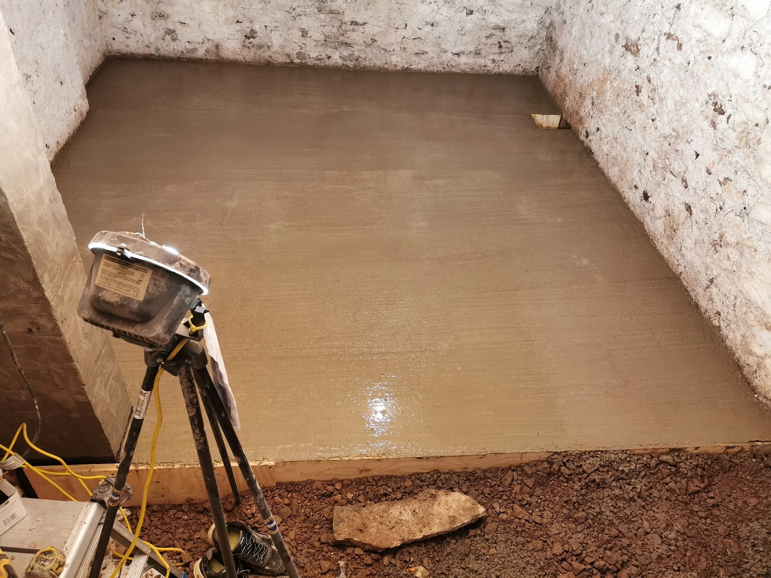 Concrete base to a basement