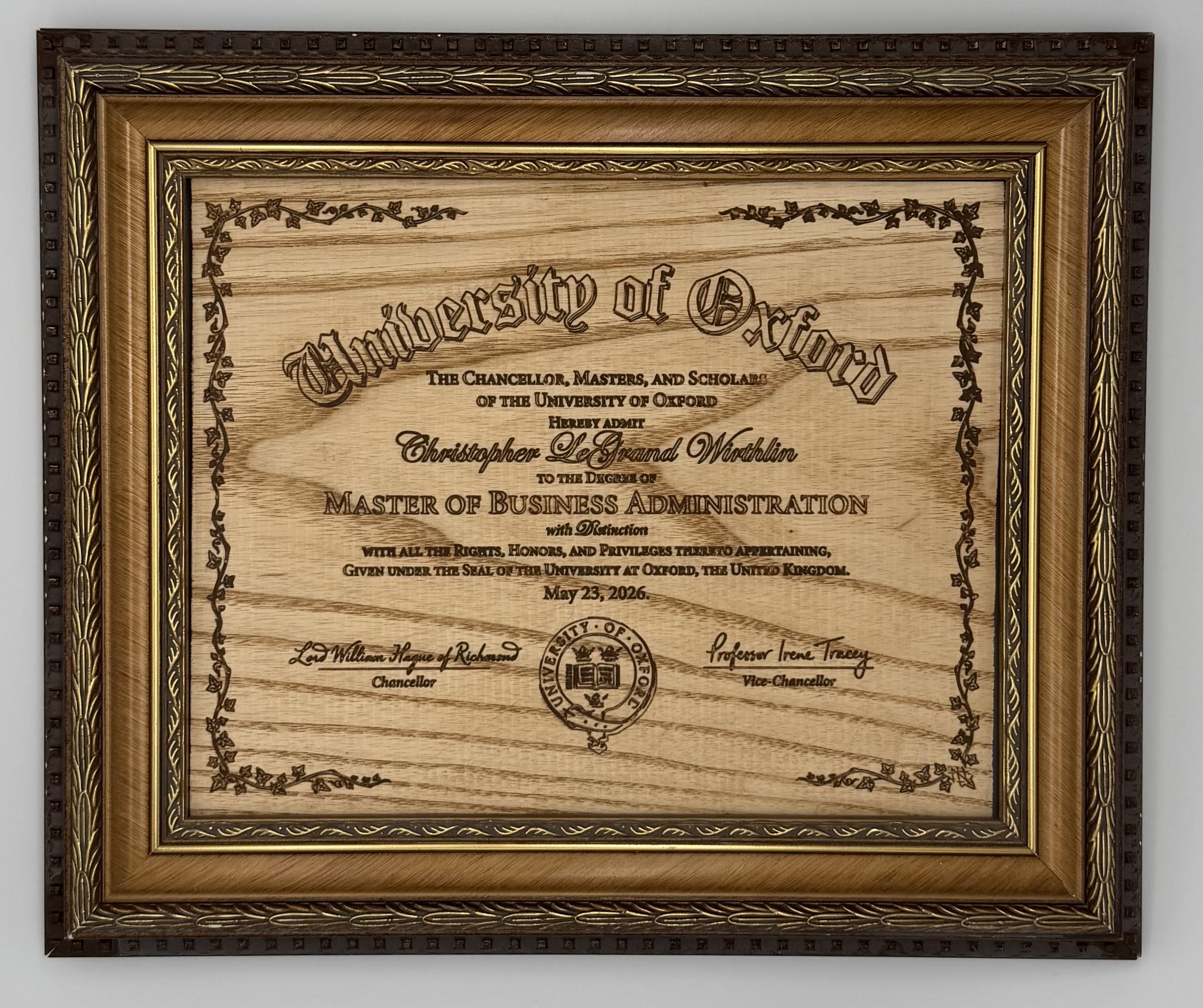 Wooden framed certificate from the University of Oxford for Christopher L. Ground Worthlin, awarded a Master of Business Administration degree, dated May 23, 2026.