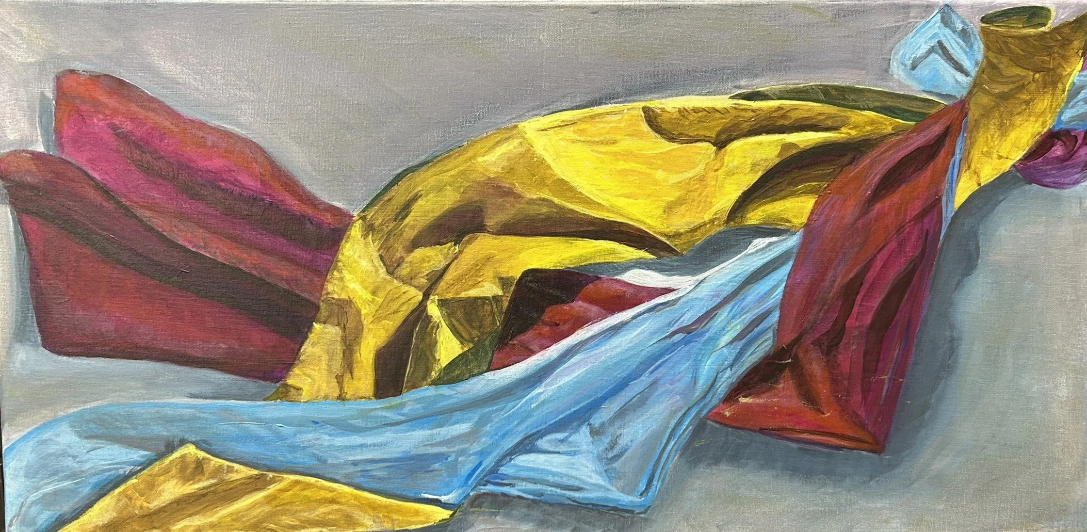 A still life featuring three pieces of fabric carefully arranged to emphasize flowing folds, texture, light, and shadow.