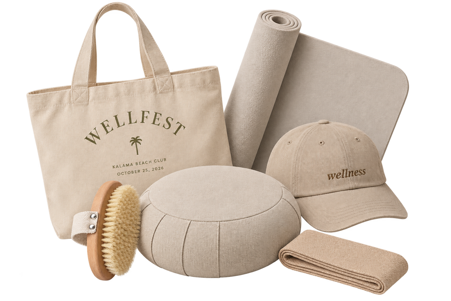 A collection of wellness products in neutral tones, including a tote bag with 'WELLFEST' and a date, a rolled yoga mat, a baseball cap with 'wellness' embroidered, a massage or sofa cushion, a wooden body brush with bristles, a textured towel, and a large textured mat.