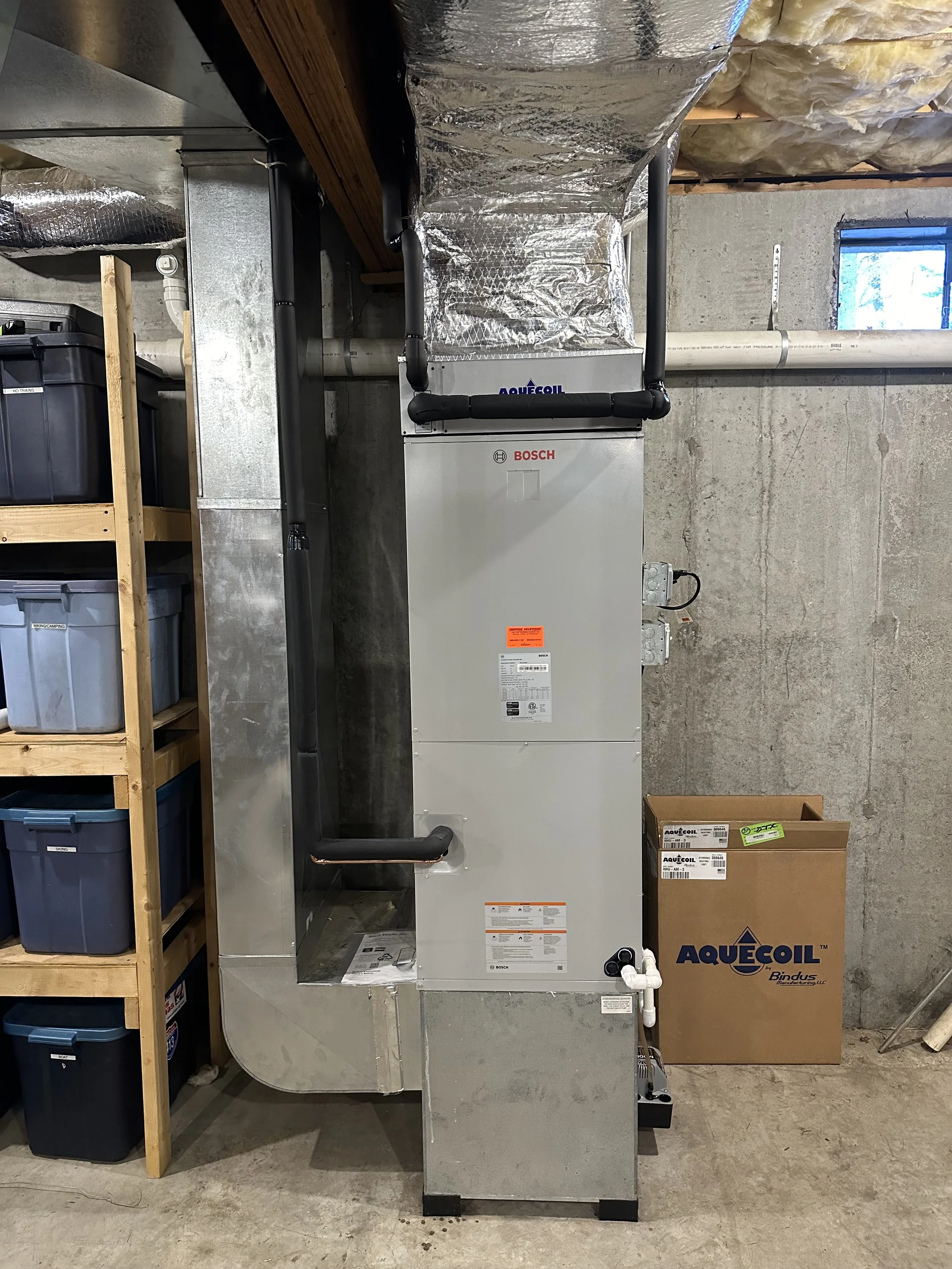 Bosch air handler and AquaCoil hydronic coil installed by Service Solutions in Central Massachusetts