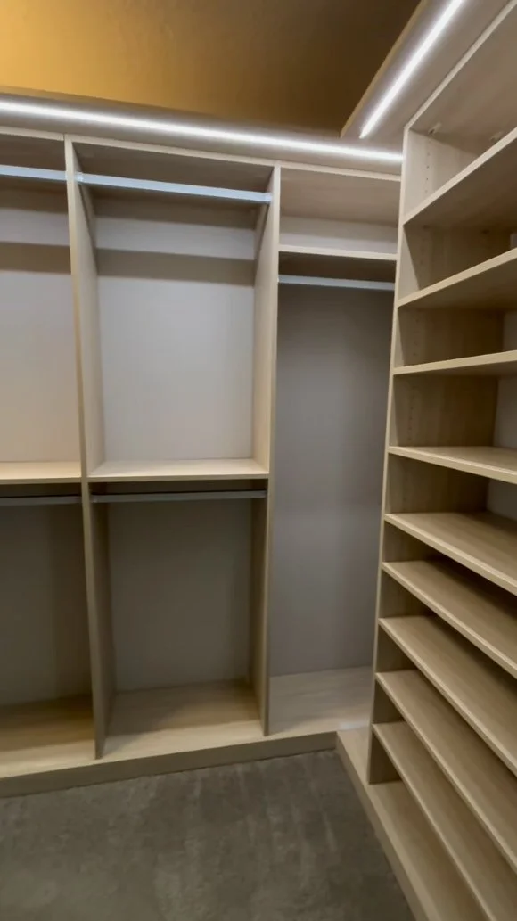 walk-in closet with custom shelving