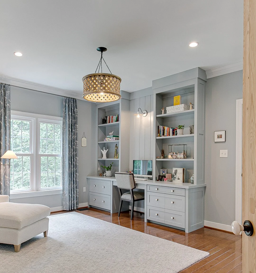 custom light gray home office with open shelving drawers and desk top
