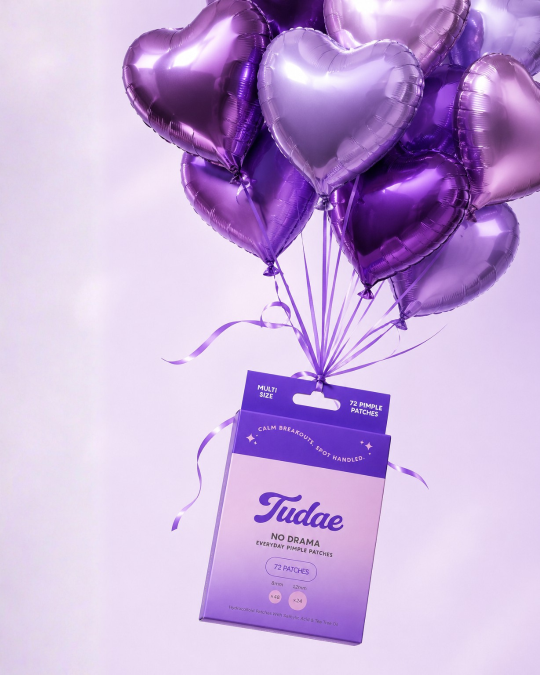 Purple box of Tudae pimple patches with 72 patches, including multi-size hydrocolloid patches with salicylic acid and tea tree oil