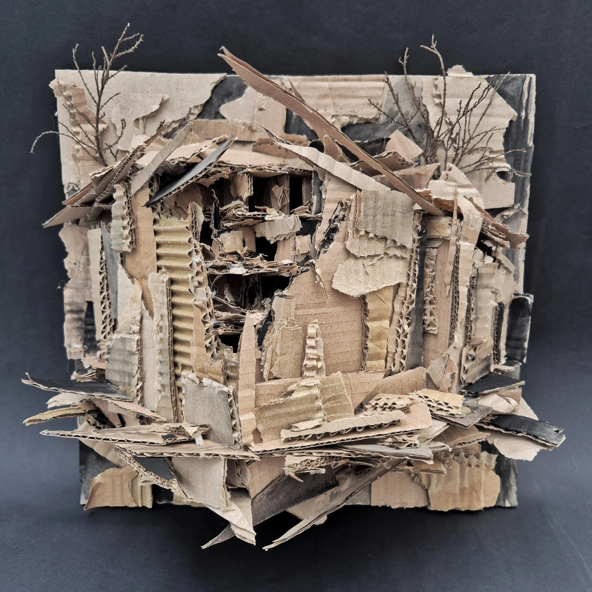 Once a home, now a ruin. 36cm × 35cm. Cardboard.