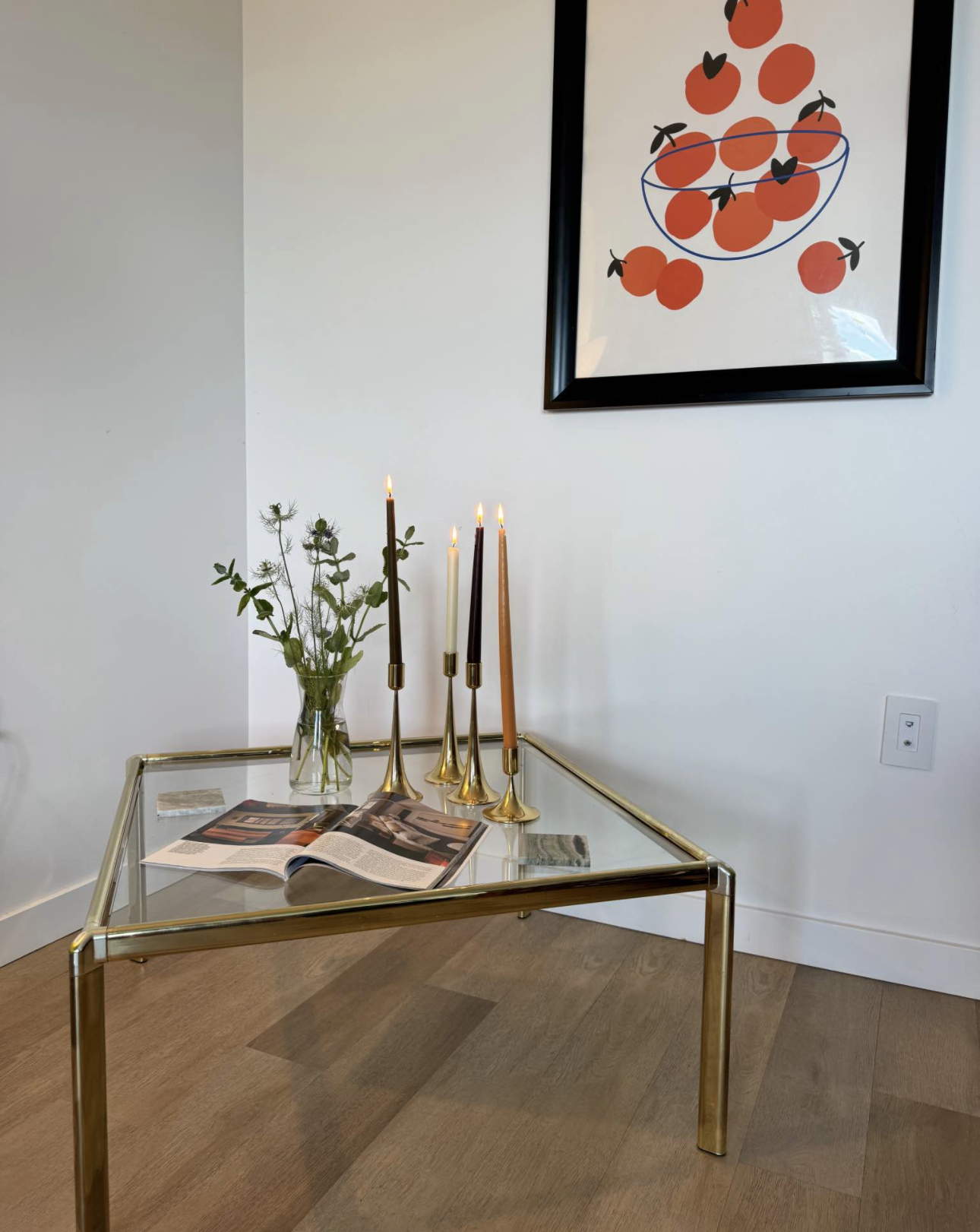 Gold and glass coffee table with unique design and vintage flare 