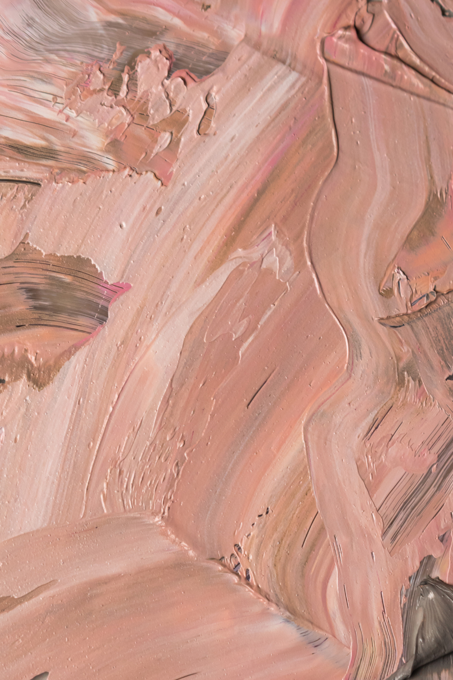 Close-up of an abstract painting with thick brushstrokes in shades of pink, beige, and hints of gray.