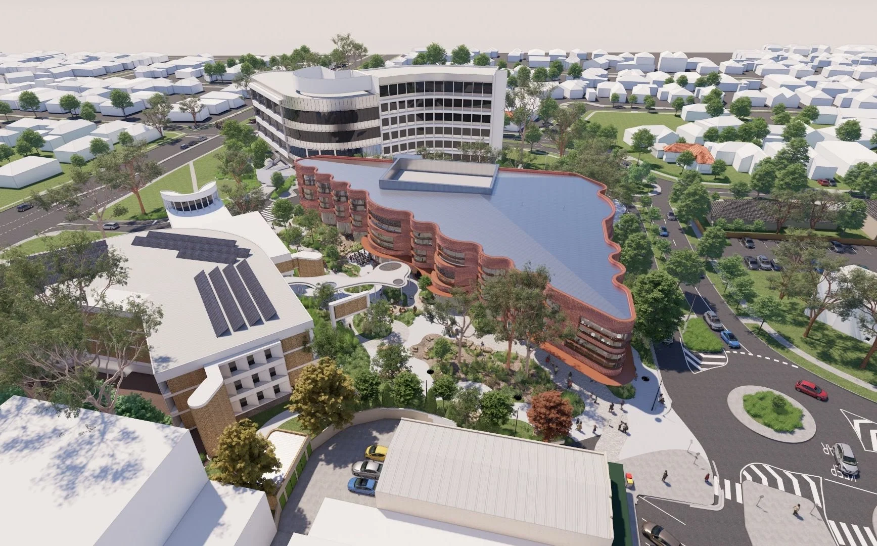 Aerial render of the precinct, its curved brick building set among surrounding streets and trees