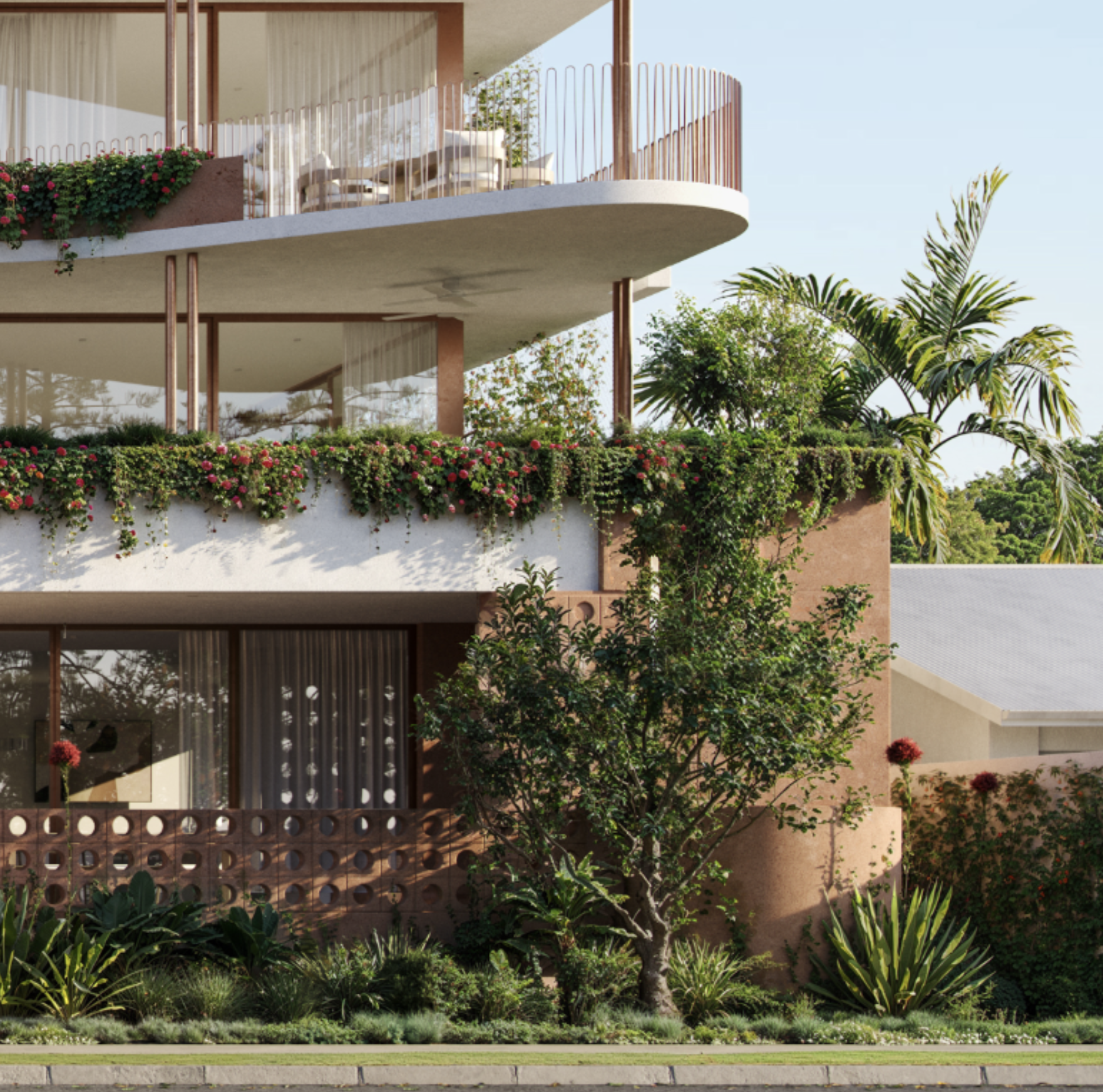 Curved slab edges and planted balconies of Burleigh House rising above a solid base with a patterned breeze block wall