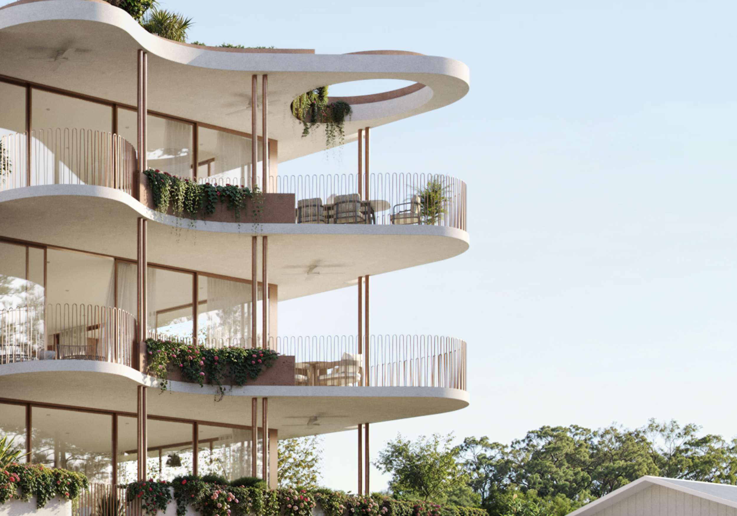Close-up of Burleigh House's curving balconies with slim timber posts, trailing plants and outdoor furniture