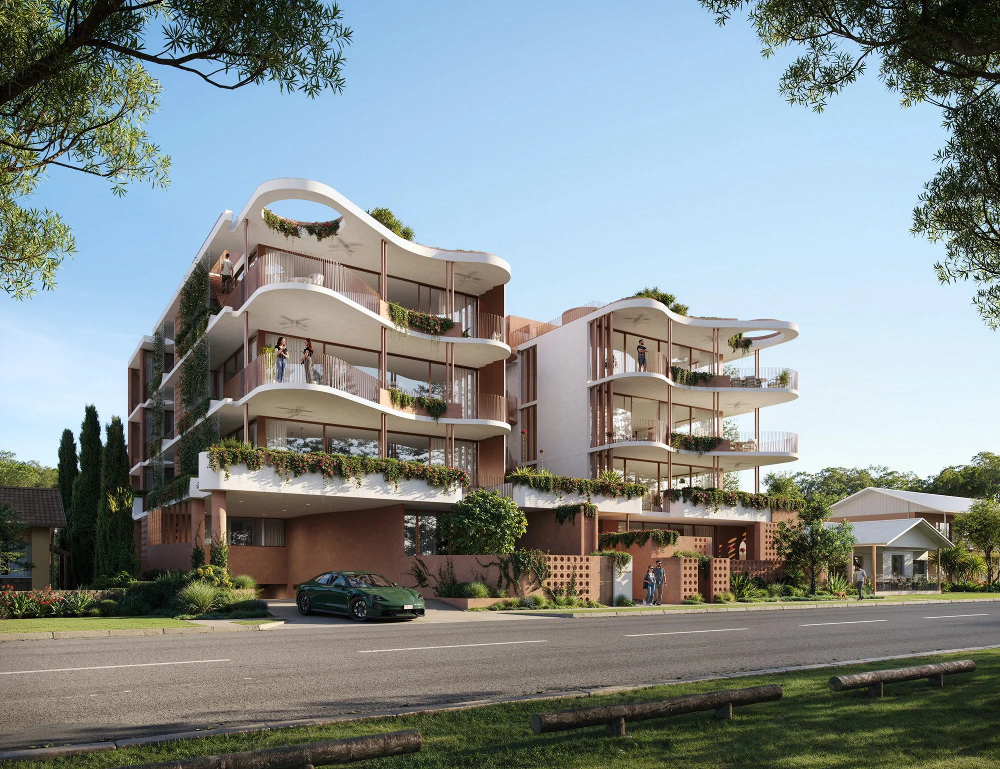 Burleigh House from the street, two curving multi-residential forms with planted balconies, set among palms on Awoonga Avenue, Burleigh Heads