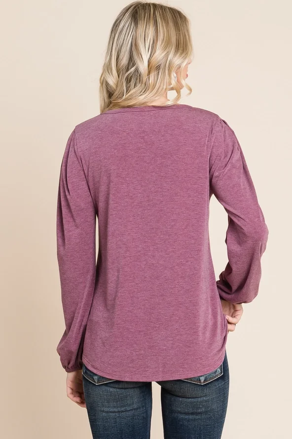 The Rosalie Top in plum with decorative button-front detail
