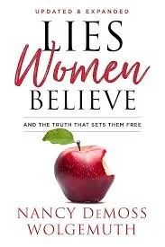 Book cover titled 'Lies Women Believe' by Nancy DeMoss Wolgemuth, featuring an image of a bitten red apple.