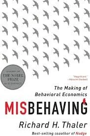 Cover of the book titled "Misbehaving" by Richard H. Thaler, featuring a pattern of gray birds in flight and referencing the Nobel Prize in Economics.