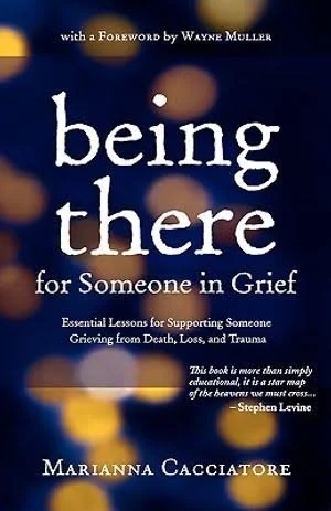 Book cover titled 'Being There for Someone in Grief' by Marianna Cacciatore, with a foreword by Wayne Muller. The cover features blurred circular lights and a dark blue background.