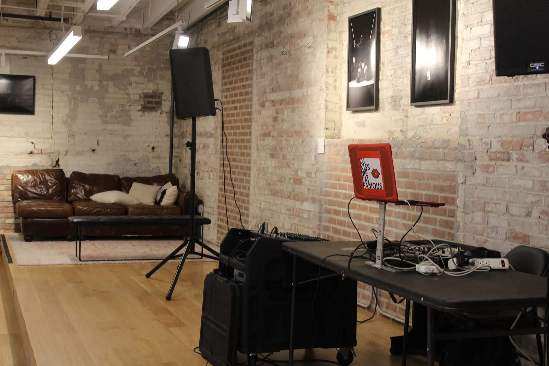 Spit and Paint, a Winning Ways Program. The front stage with a laptop and speaker setup.