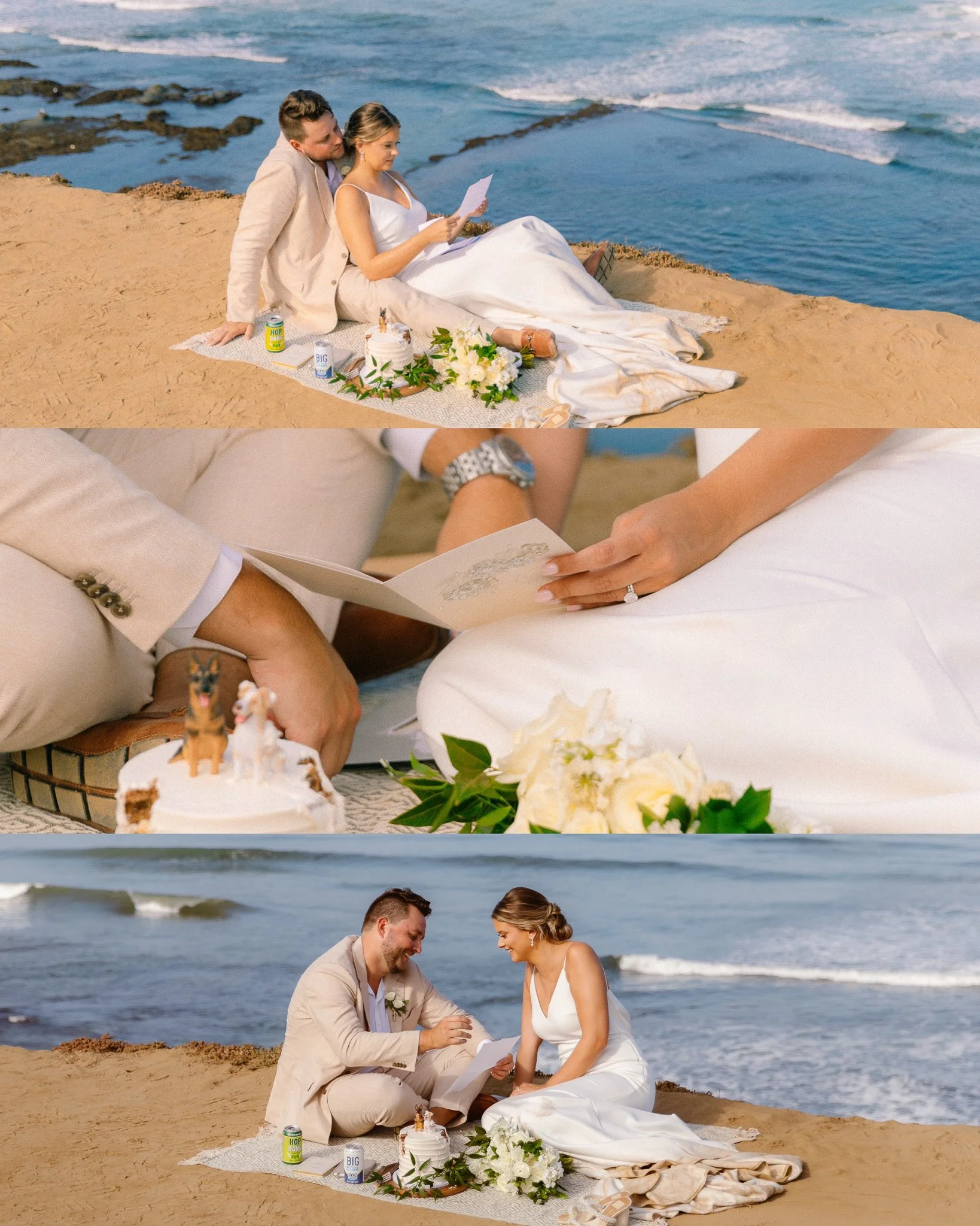 A wedding ceremony taking place on a sandy beach along the ocean. A bride and groom are sitting on the sand, exchanging rings and smiling at each other, with wedding decorations including a small cake, flowers, and drinks nearby.