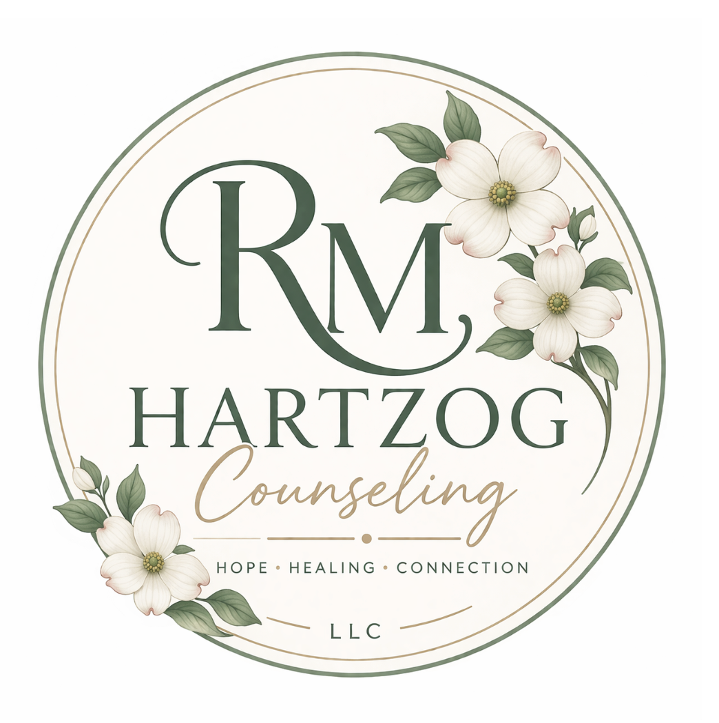 Logo of RM Hartzog Counseling featuring white flowers and green leaves, with the words 'Hope, Healing, Connection' and 'LLC'.