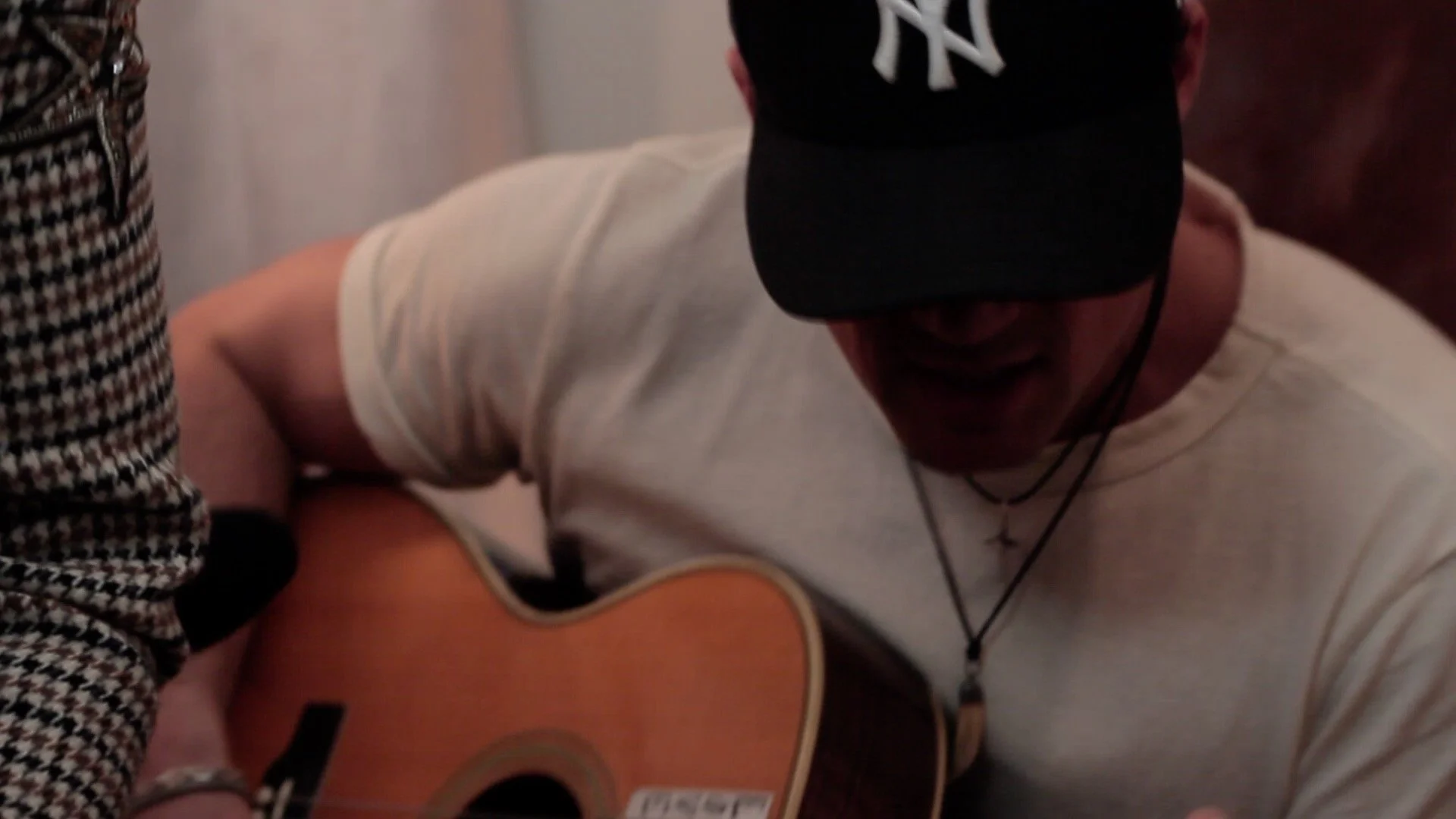 Austin Cain playing guitar and singing background vocals with Franni Cash during Honest To God.