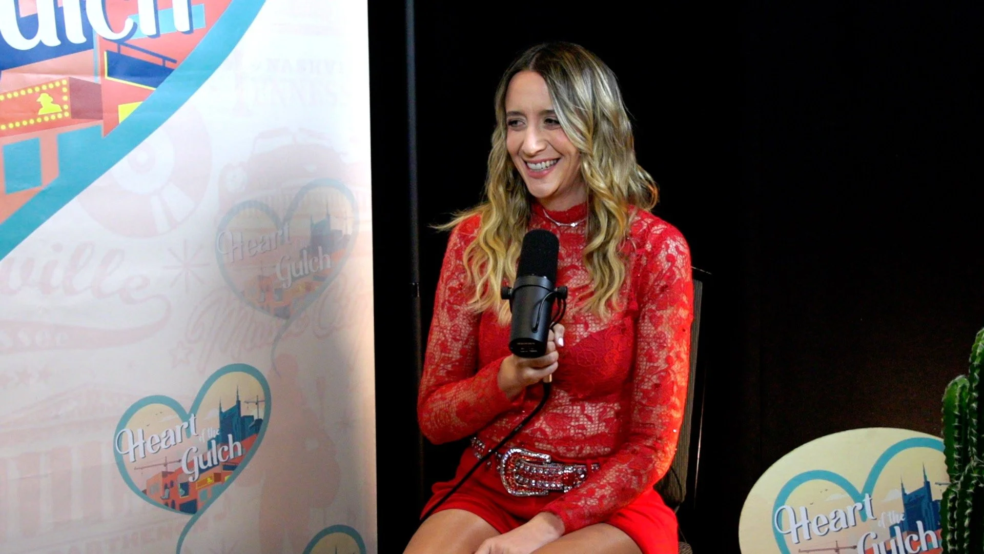 Kaylee Bell discussing “Me For Me” and “Once In A Lifetime” during a Nashville country music interview.