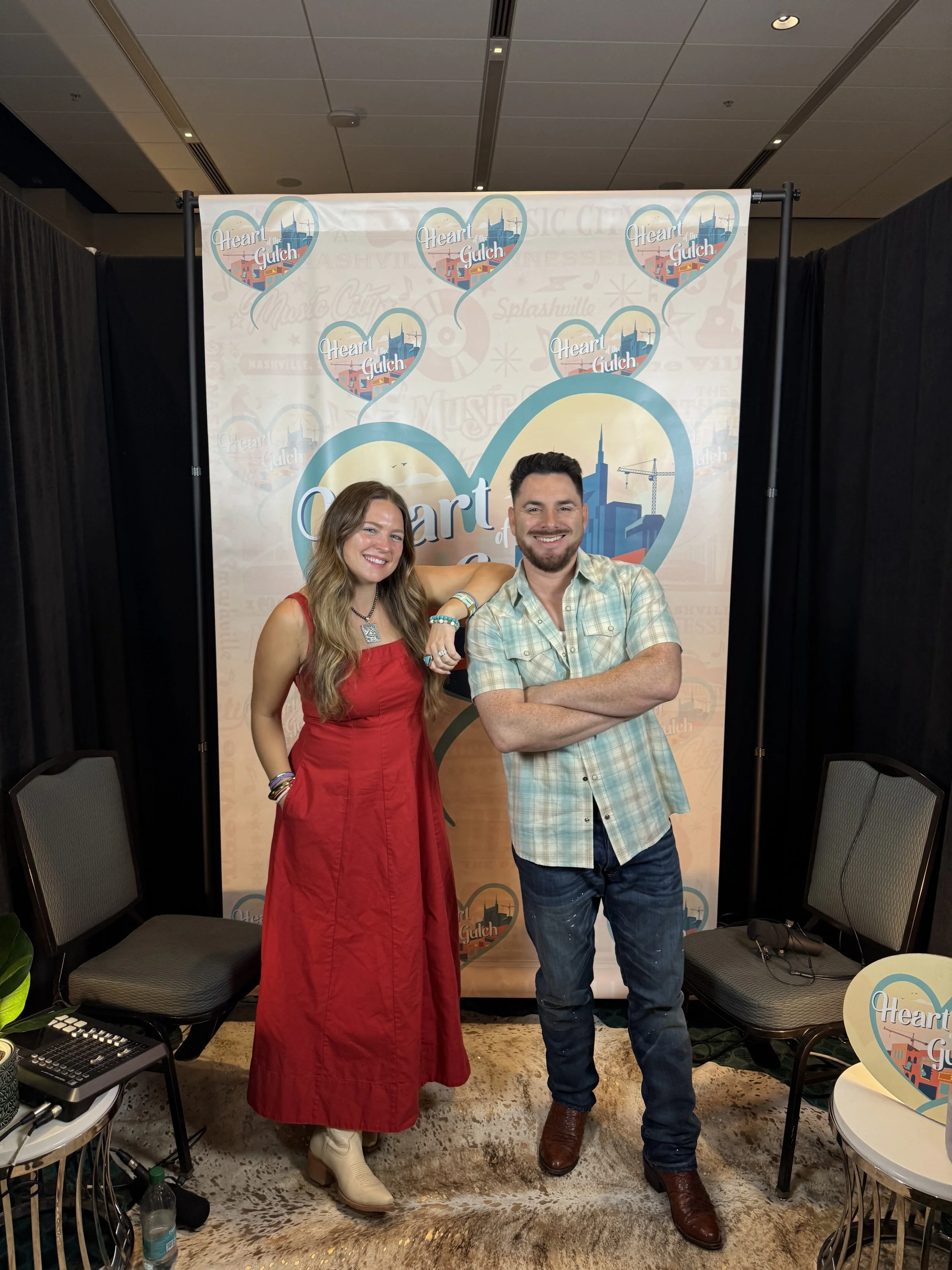 Tony Mendoza and Christian singer-songwriter Leanna Crawford pose together following their Heart of the Gulch interview during CMA Fest in Nashville.