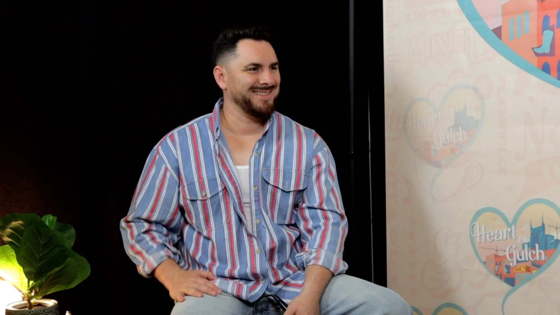 Tony Mendoza, host of Heart of the Gulch, talks with Australian country artist Tori Darke during CMA Fest 2025 in Nashville.