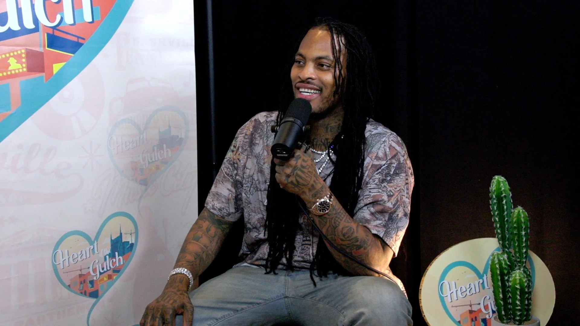 Tony Mendoza, host of Heart of the Gulch, interviews rapper and entertainer Waka Flocka Flame during CMA Fest in Nashville.