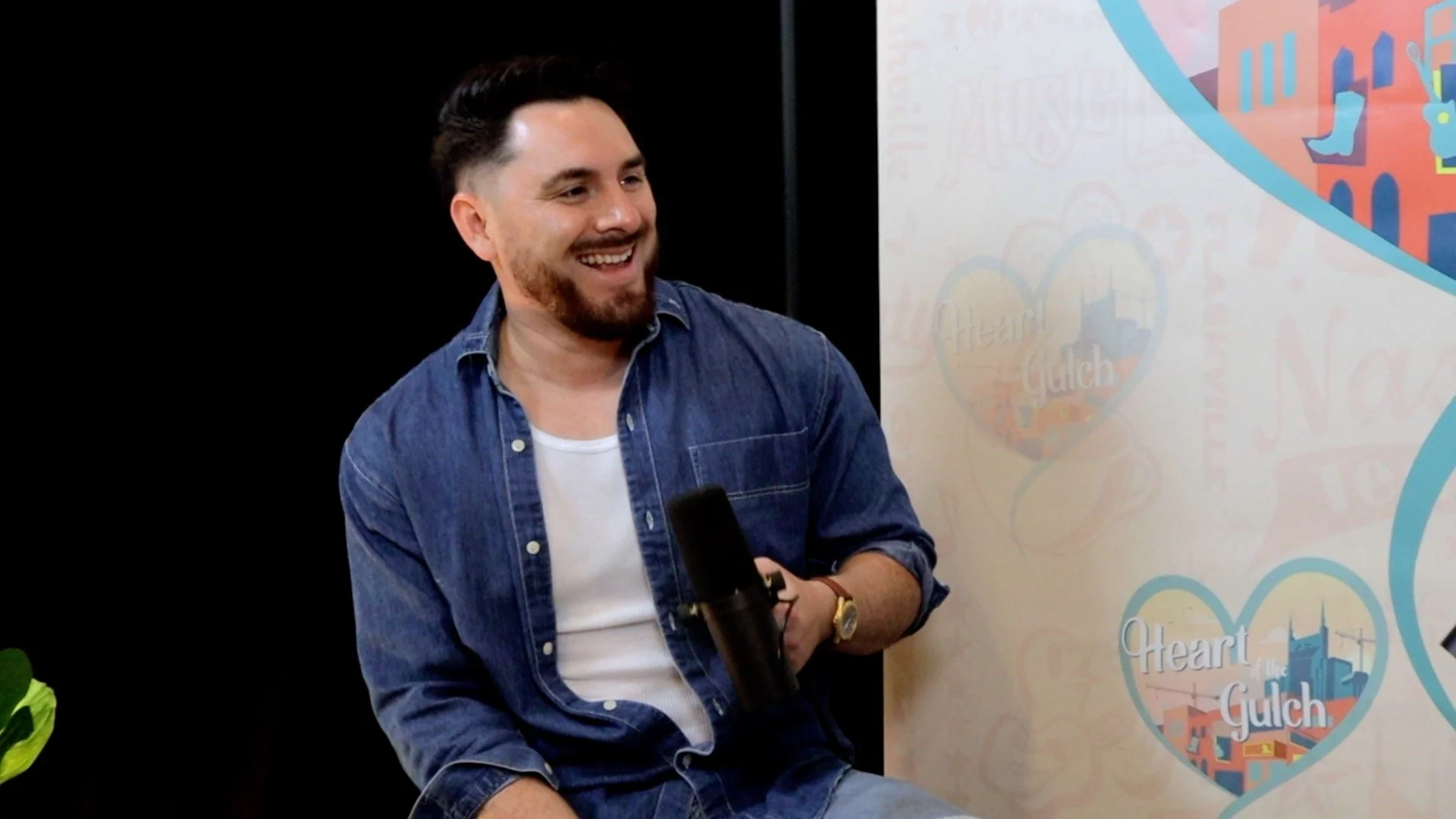 Tony Mendoza interviewing Big Loud Texas country artist Jake Worthington during CMA Fest.