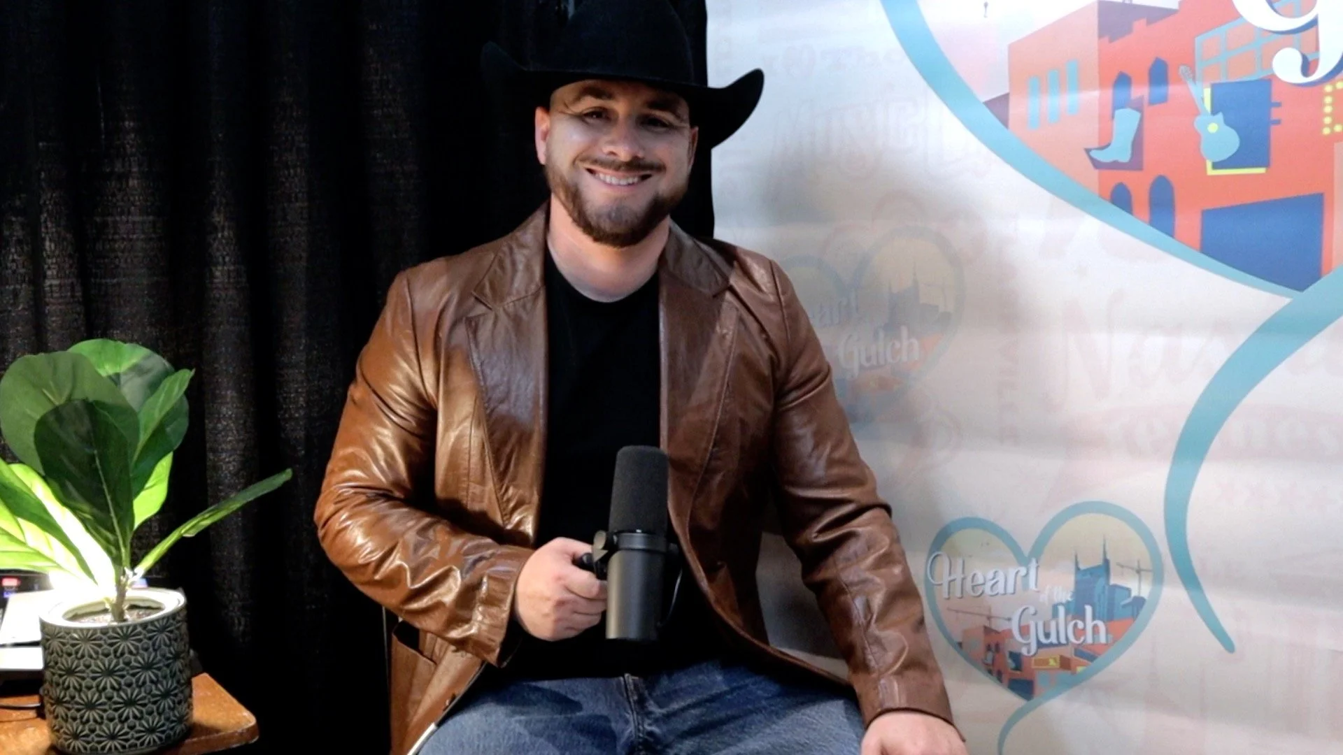 Tony Mendoza and country artist Ian Munsick pose together following their Heart of the Gulch interview at Country Radio Seminar (CRS) 2026 in Nashville.