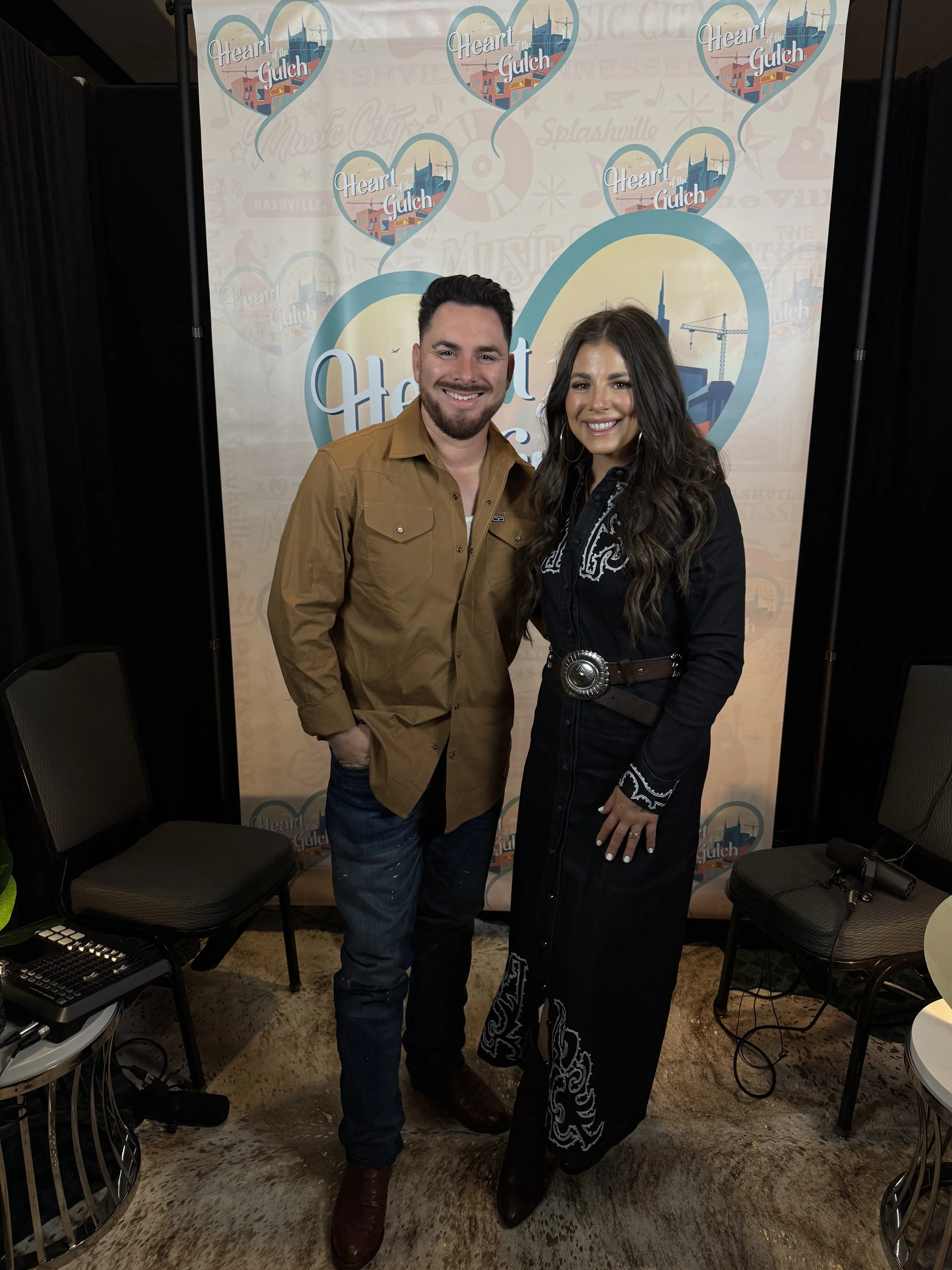 Tony Mendoza and country artist Kylie Frey pose together following their Heart of the Gulch interview during CMA Fest in Nashville.