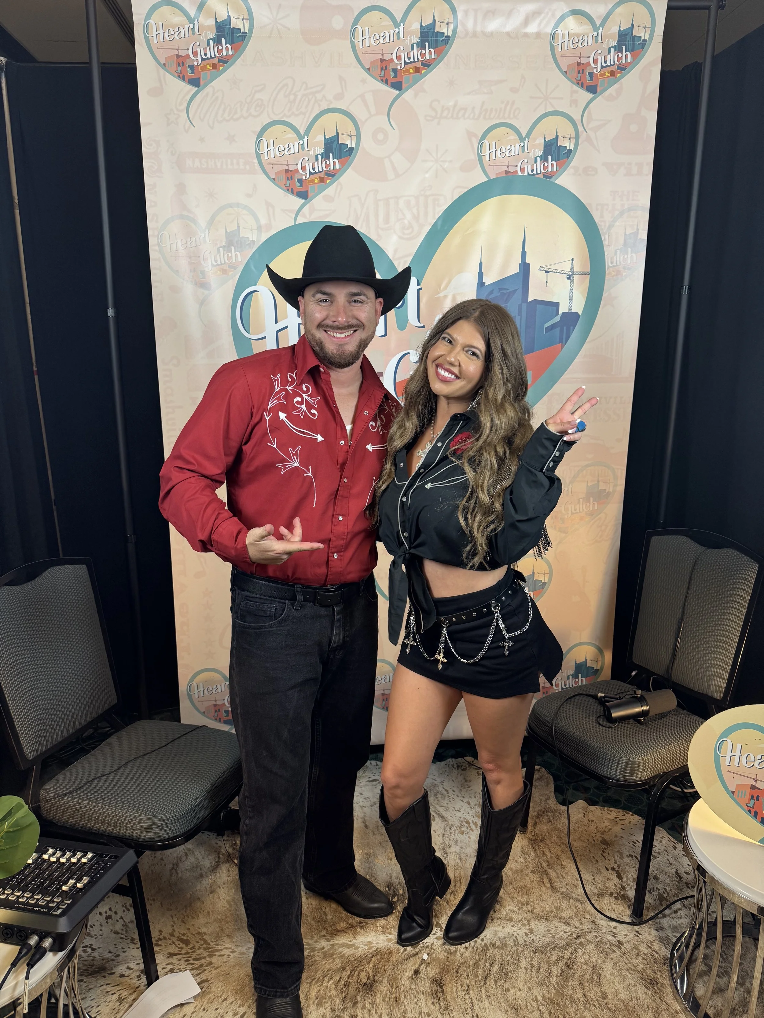 Tony Mendoza and Chanel West Coast pose together following their Heart of the Gulch interview during CMA Fest in Nashville.