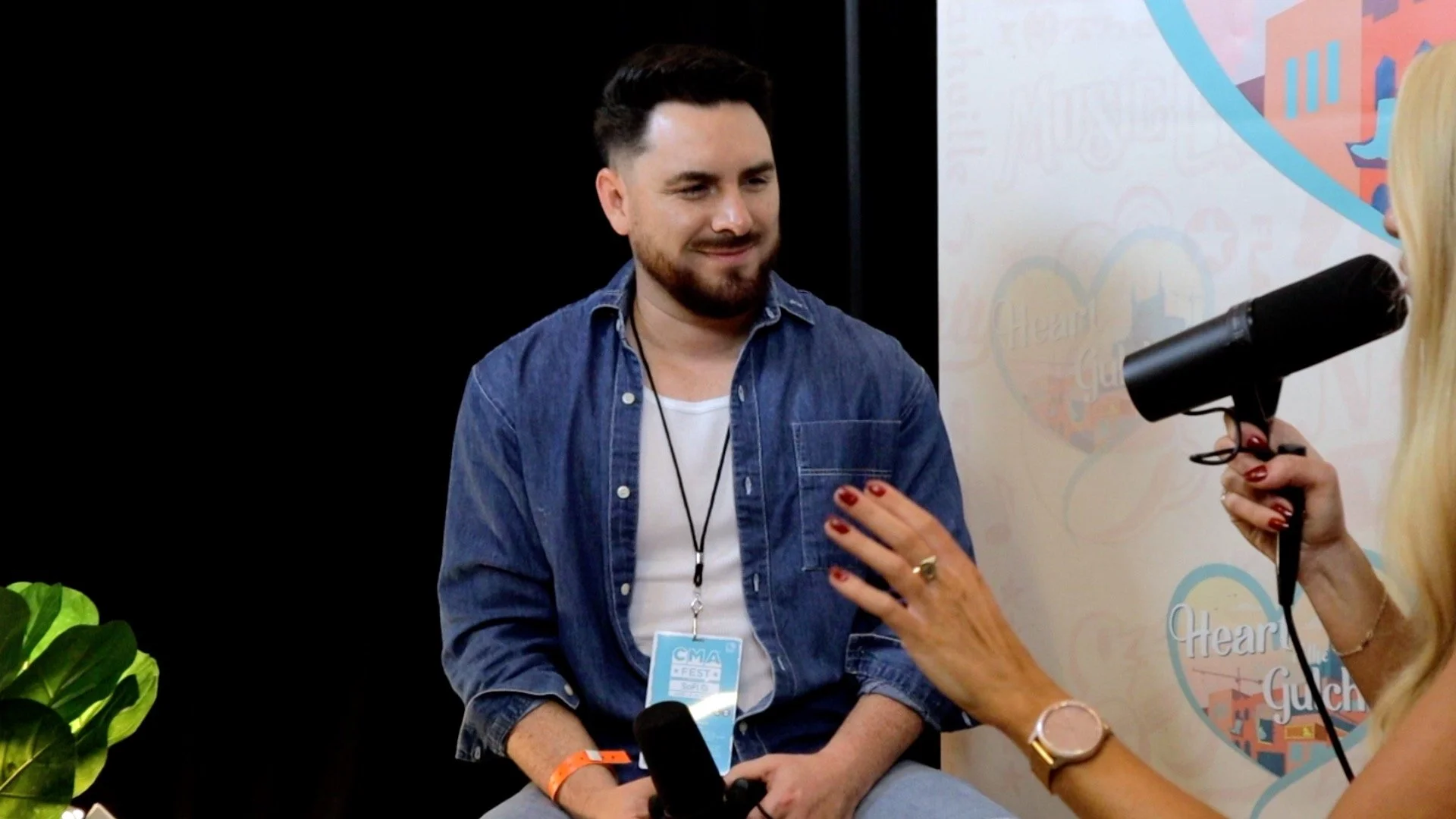 Tony Mendoza interviewing independent country artist Julia Cole during CMA Fest in Nashville.