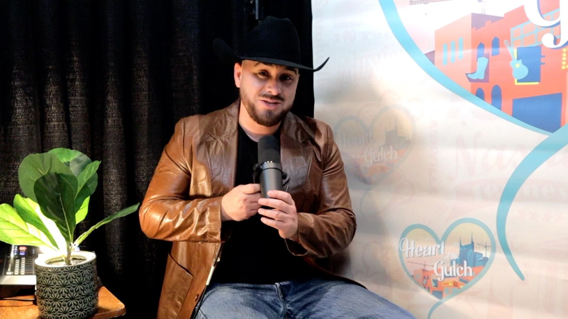 Tony Mendoza and country singer-songwriter Kelsi Mayne pose together following their Heart of the Gulch interview at Country Radio Seminar (CRS) 2026 in Nashville.