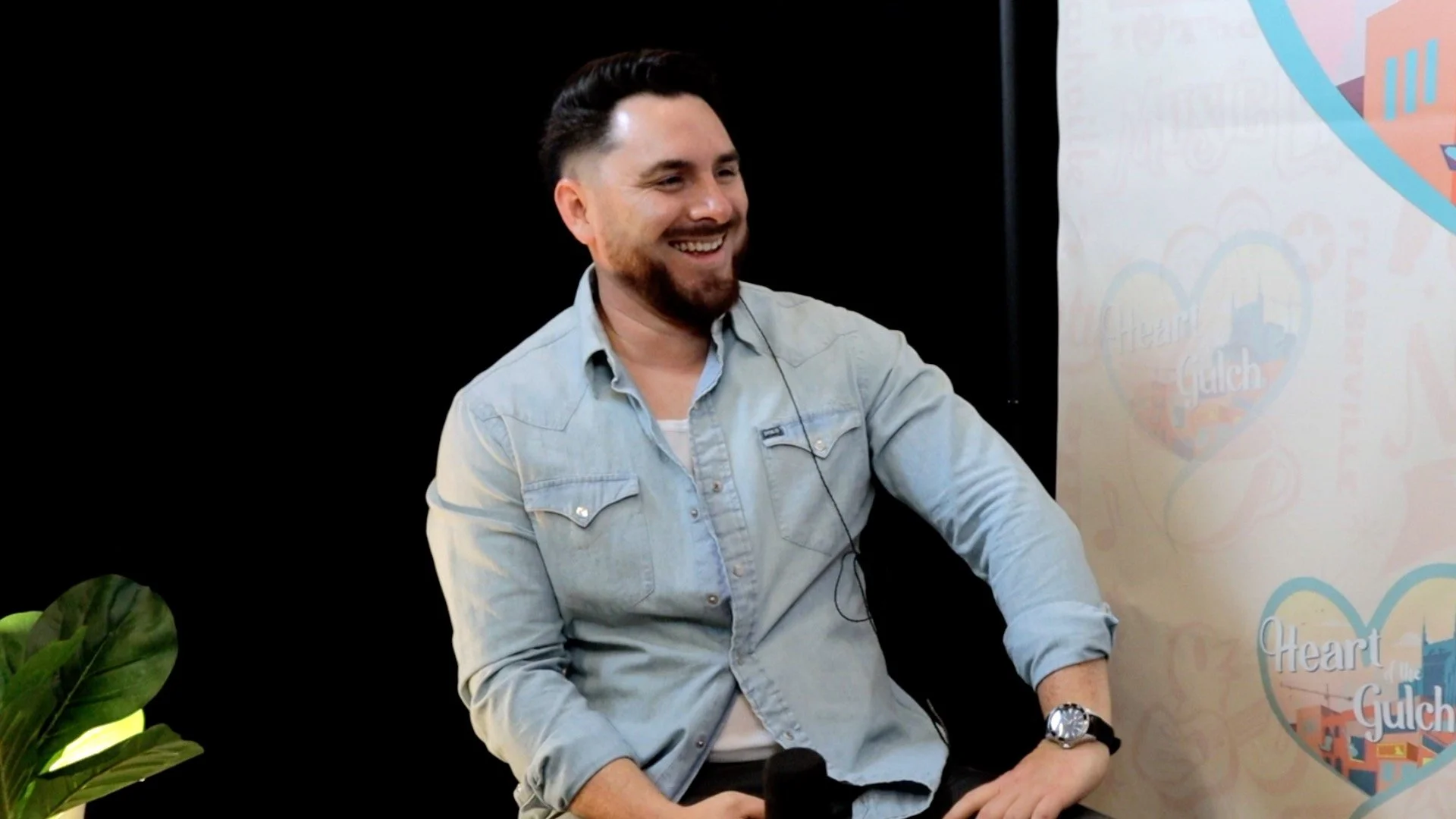 Tony Mendoza interviewing country singer Walker Montgomery during CMA Fest in Nashville.