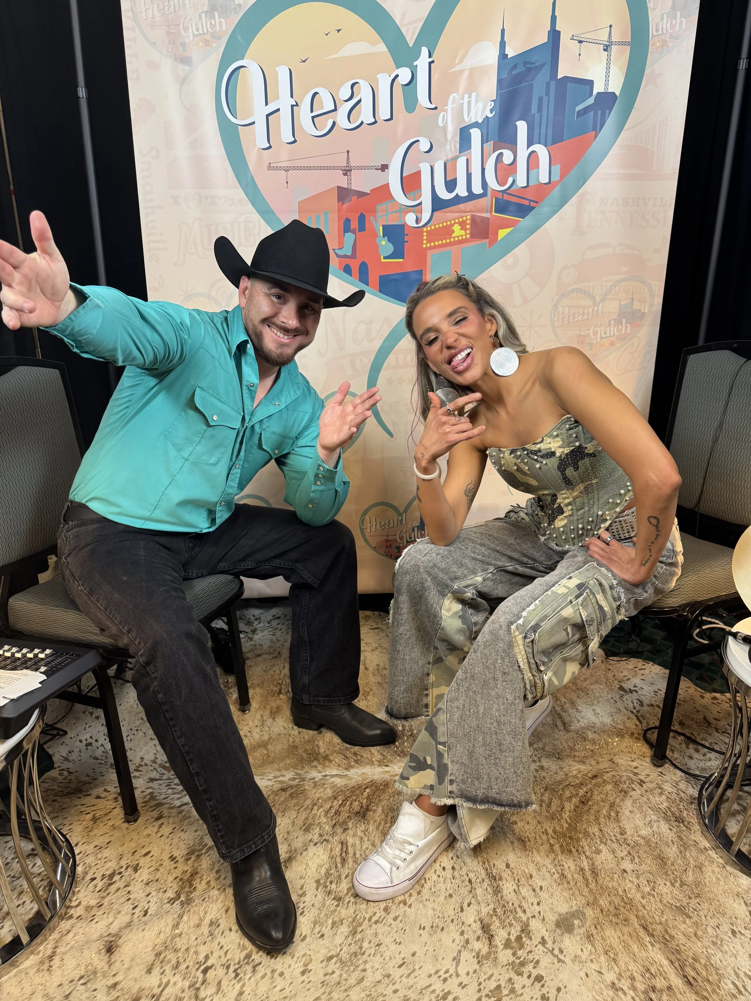 Tony Mendoza and country singer-songwriter Shaylen pose together following their Heart of the Gulch interview during CMA Fest in Nashville.