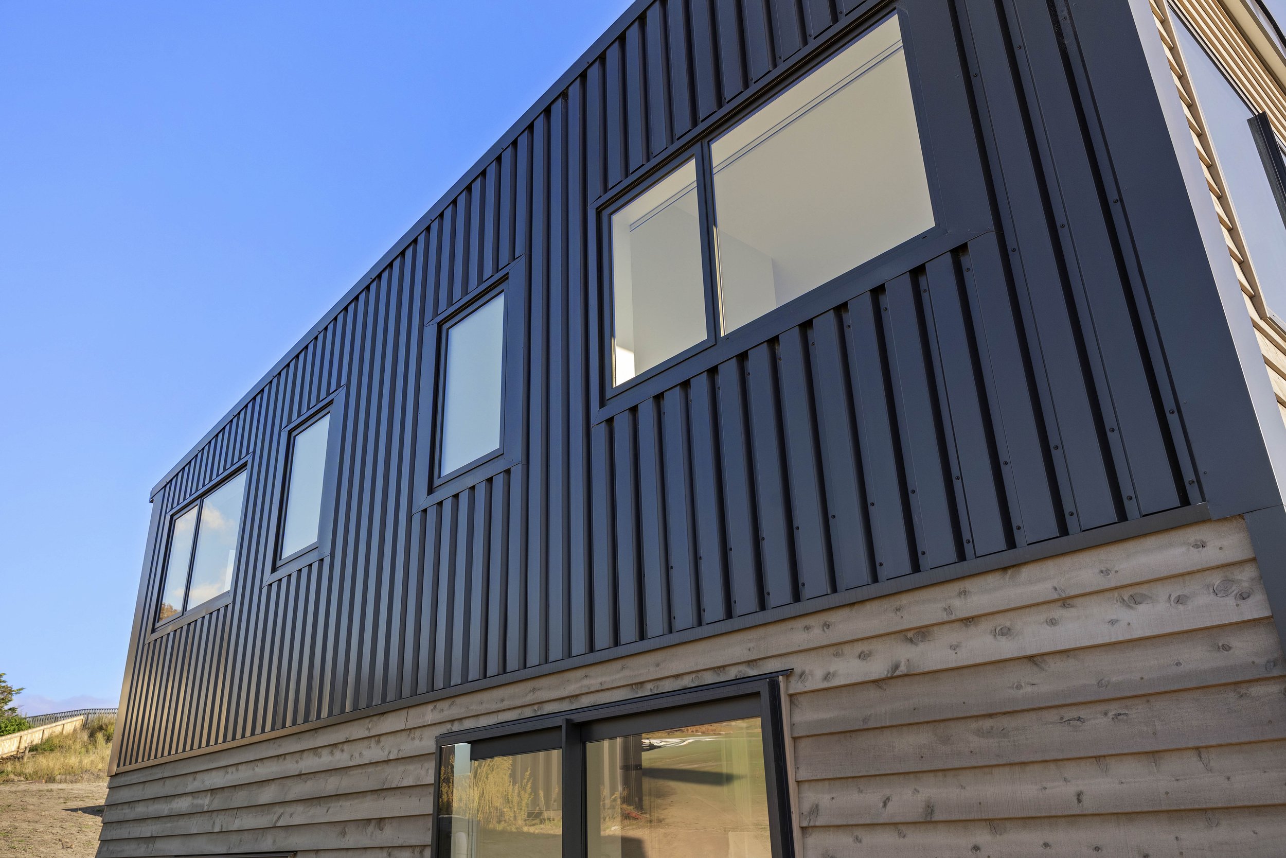 Metal and timber cladding mix