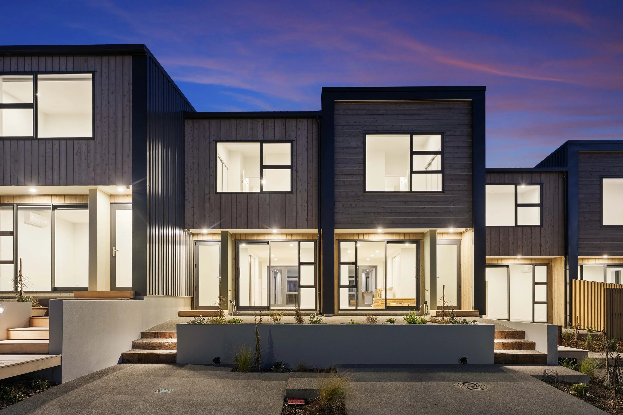 Retaining walls to create terraced courtyards for outdoor living