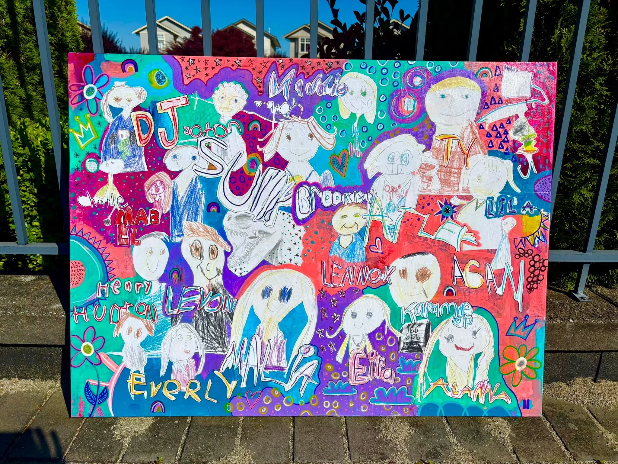 Colorful, hand-drawn poster with cartoon characters, decorative elements, text, and words such as 'DJ', 'Brooklyn', 'Ty', 'Lennox', and 'Everyone'. The poster has a vibrant, playful design with flowers, hearts, and stars.