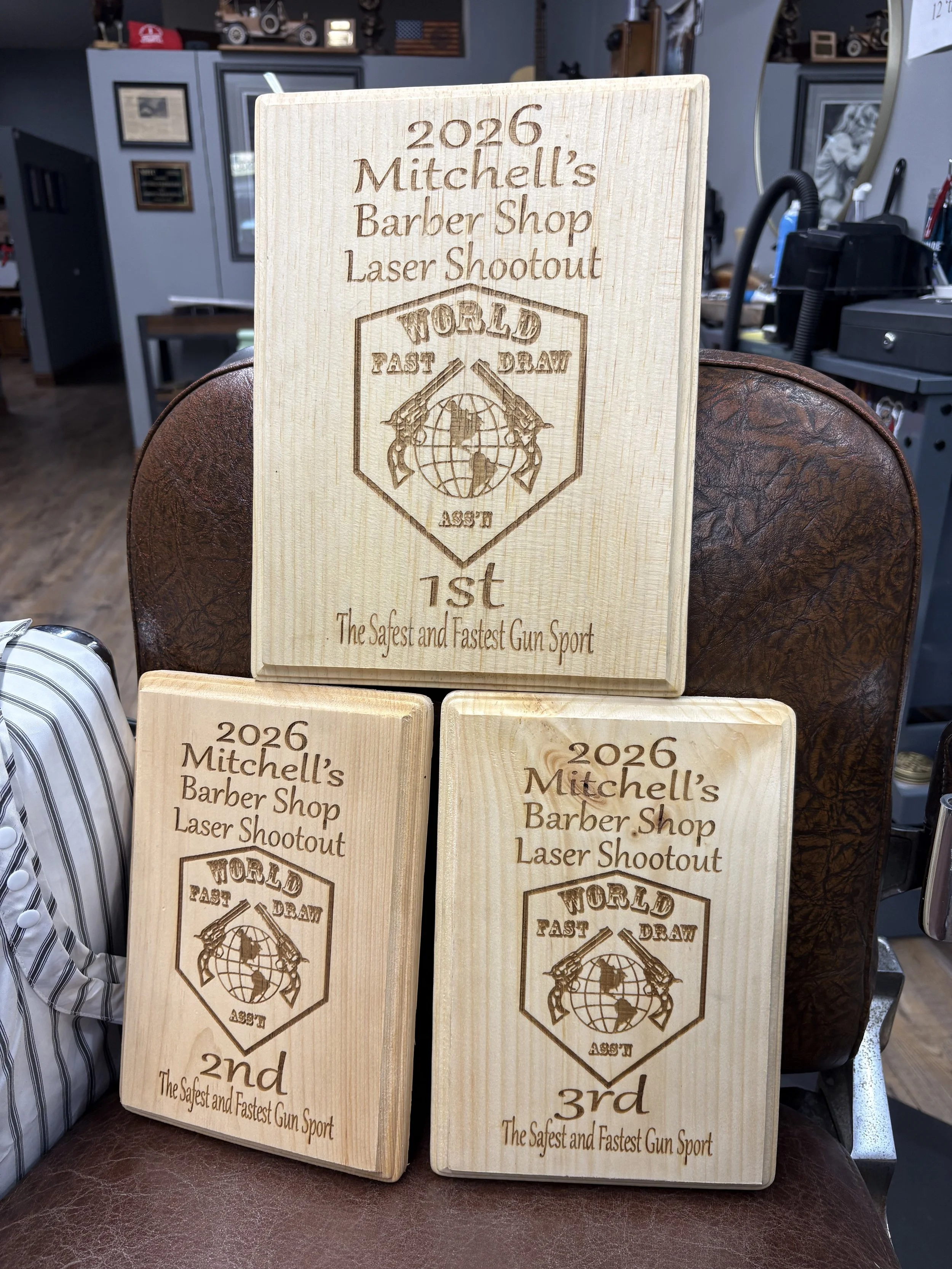 Mitchell's Barbershop Fast Draw Competition  2026 Award plaques for first, second and third place.