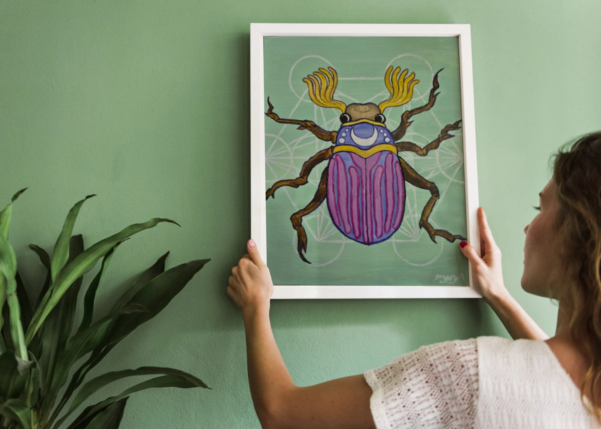 mockup june beetle green wall.jpg