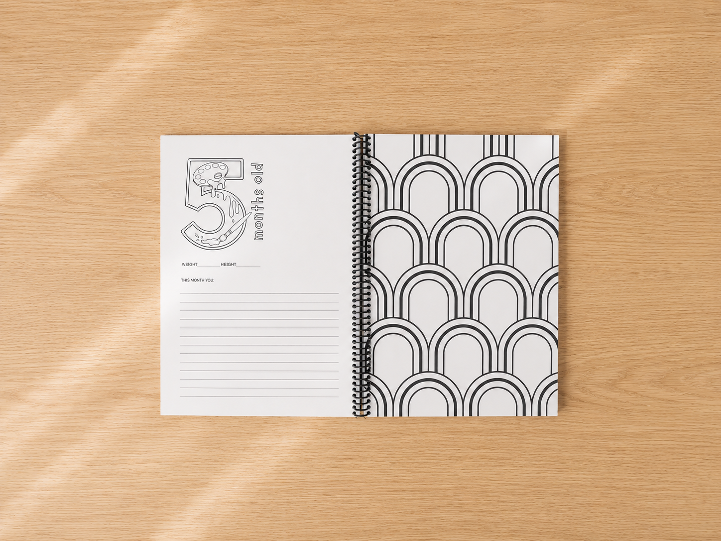 Five-month milestone page inside the Babybloom colour-in baby memory book
