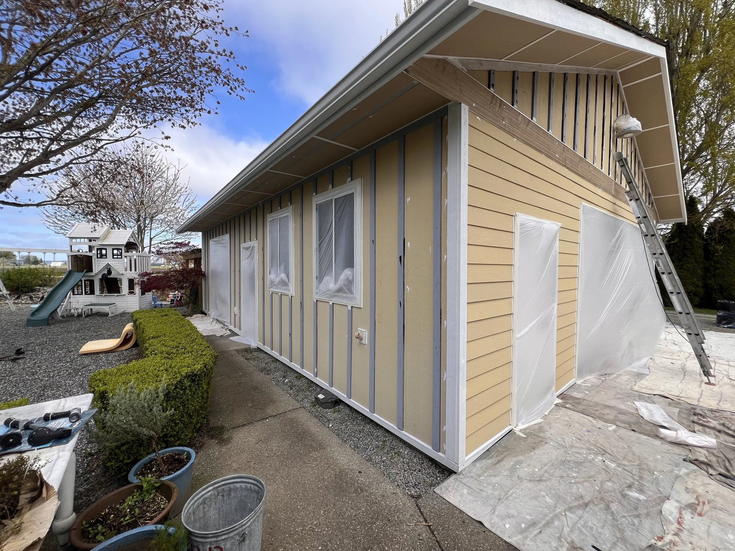 Exterior repaint restoration on a residential property 