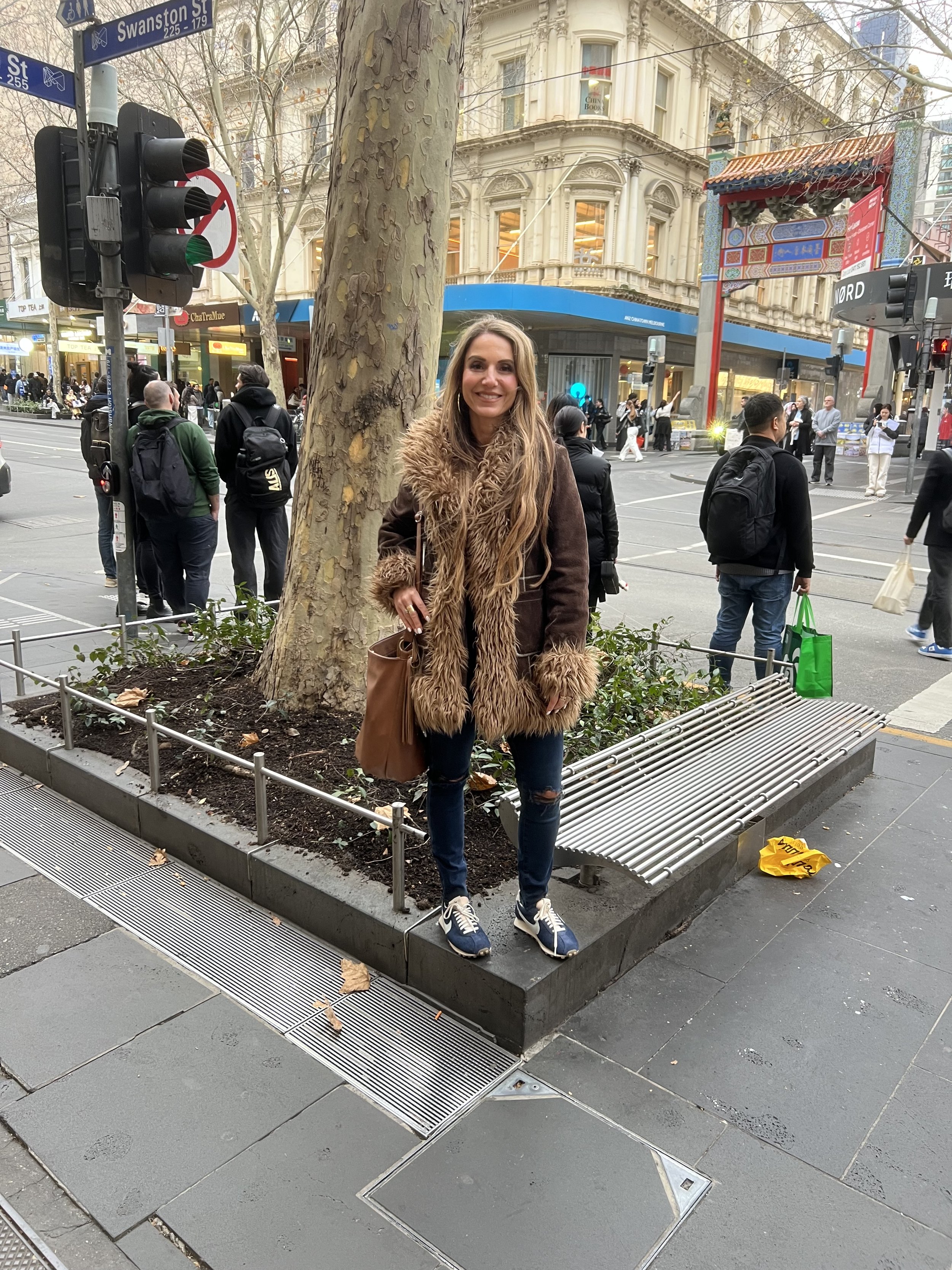 Embrace practitioner standing outdoors in Melbourne