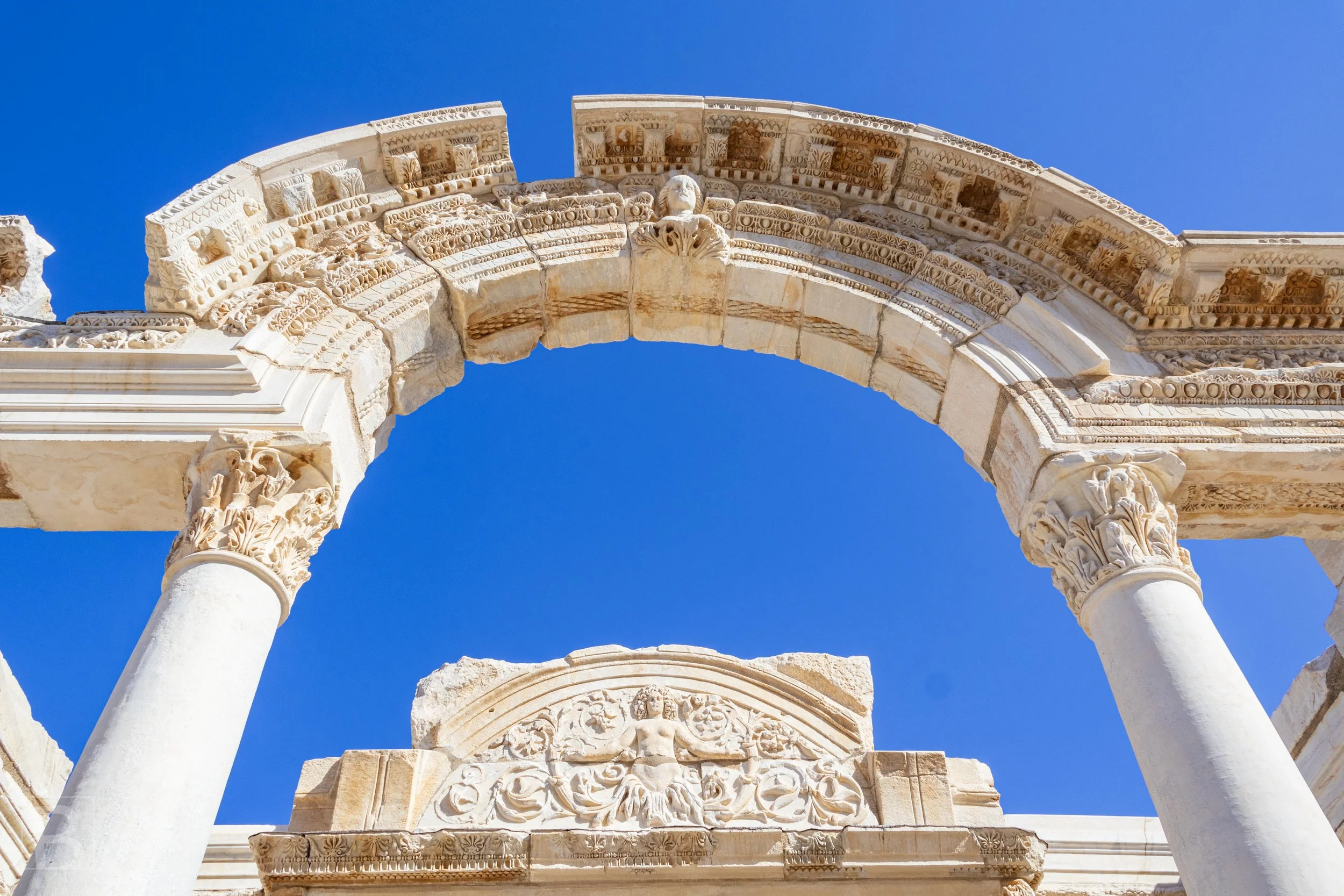 Elaborate reliefs, Corinthian capitals and a sweeping arch define one
of Ephesus's most recognisable monuments.