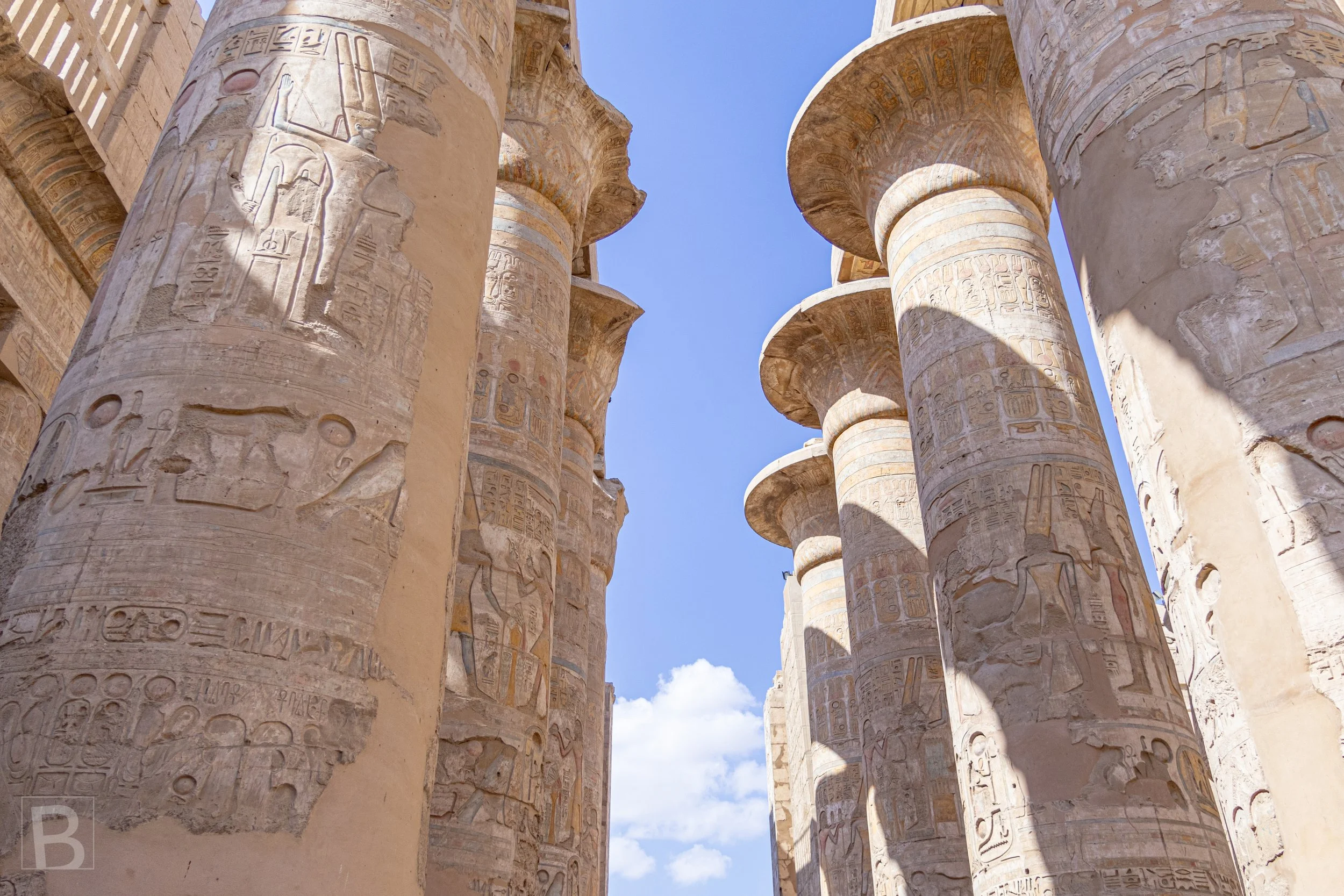 Repeating shafts and capitals create a processional rhythm through
Karnak's vast ceremonial architecture.