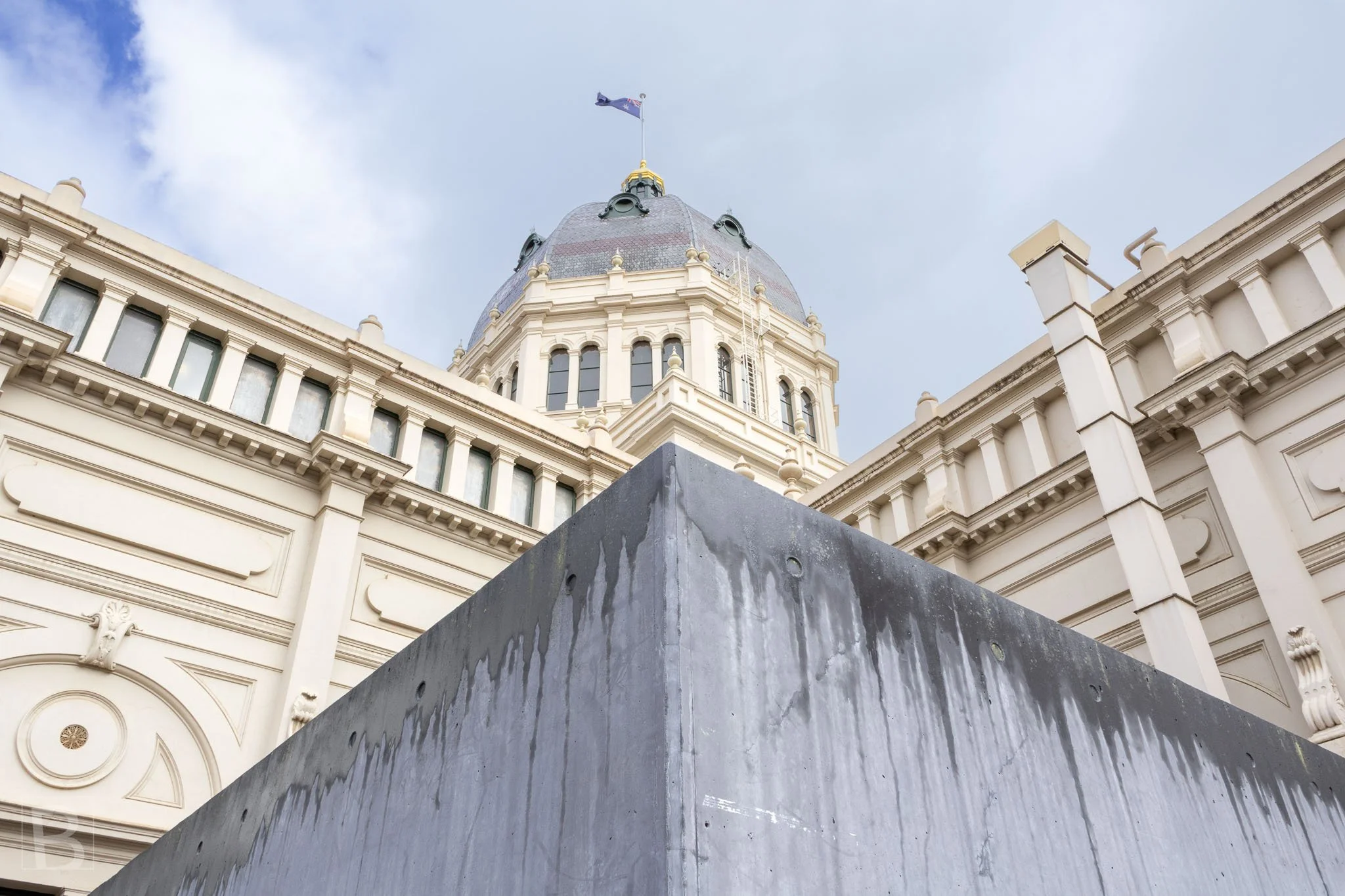 The historic dome appears above layered foreground structures,
showing how Melbourne's landmark architecture persists within the
contemporary city.