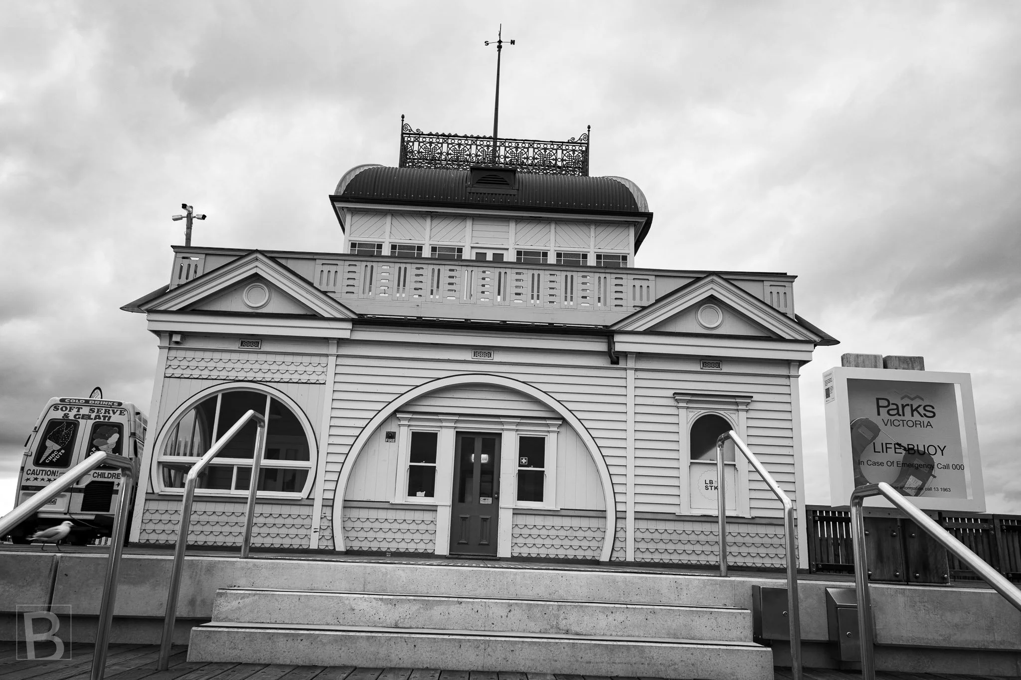 Decorative timberwork and maritime purpose come together in a
small coastal building preserved above the shoreline.